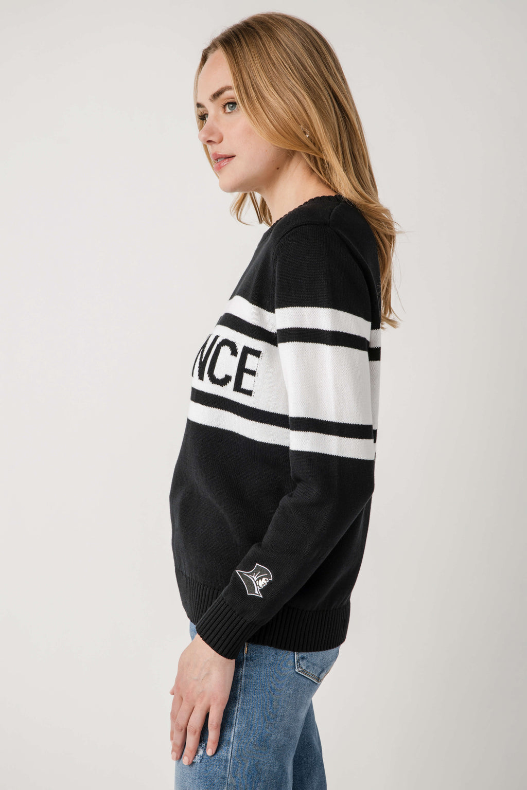 Black vintage campus sweater with white sleeve stripes and a small Providence patch