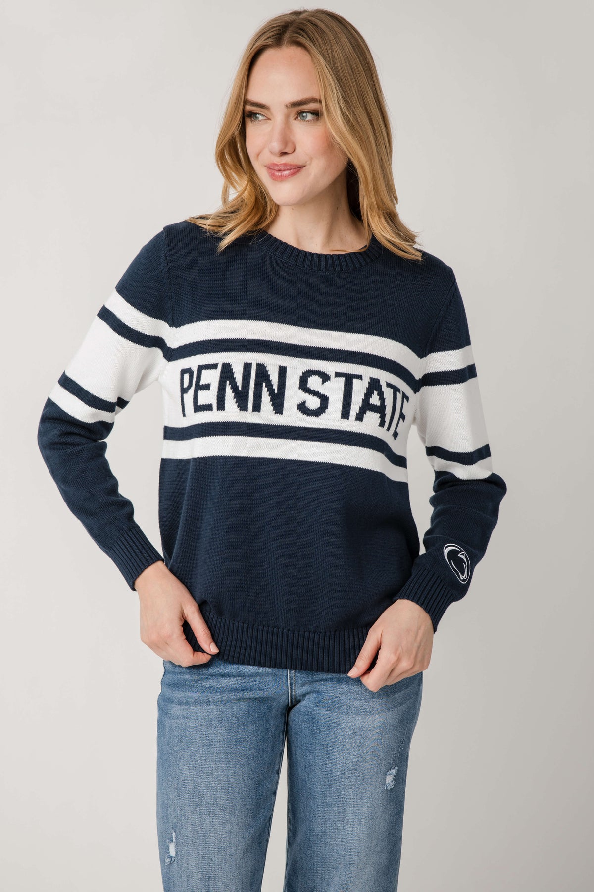 Vintage campus sweater, dark navy with white striped sleeves and Penn State logo on chest
