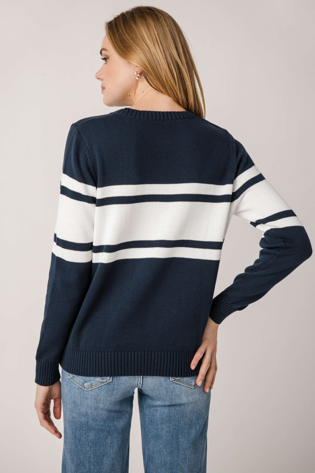 Vintage campus sweater, dark navy back with two white stripe bands across shoulders and back