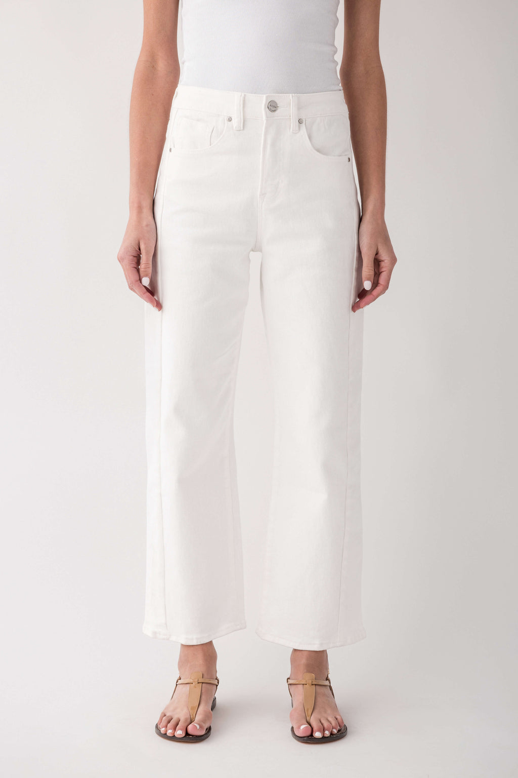 High-rise cream jeans, straight wide leg with button/zip front and side pockets