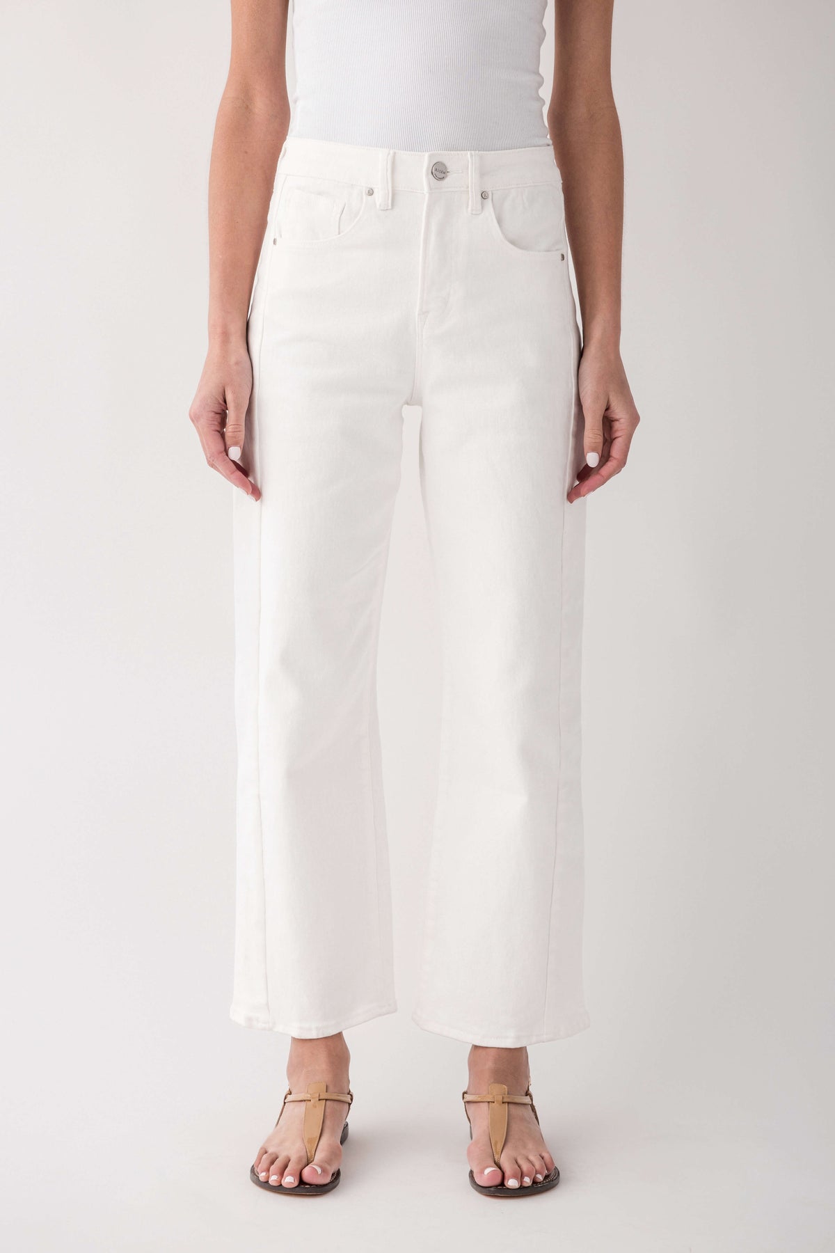 High-rise cream jeans, straight wide leg with button/zip front and side pockets