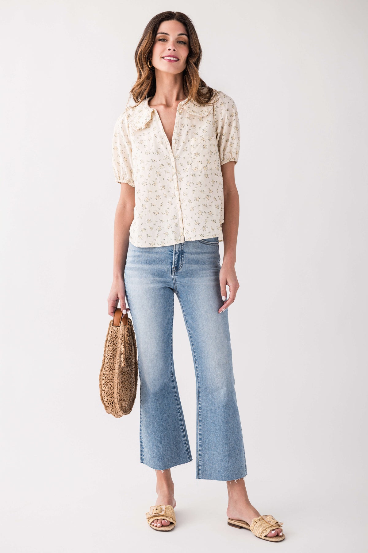 High-rise kick flare jeans in light blue wash with belt loops and straight yoke