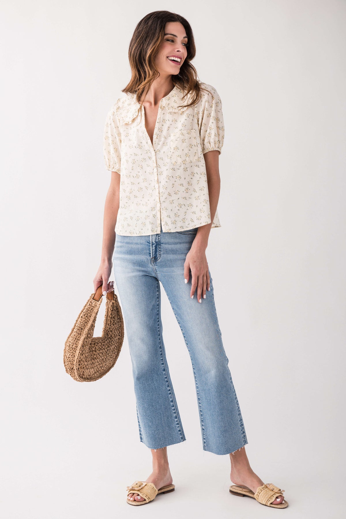 High-rise kick flare jeans in light blue denim with center front seam and pockets