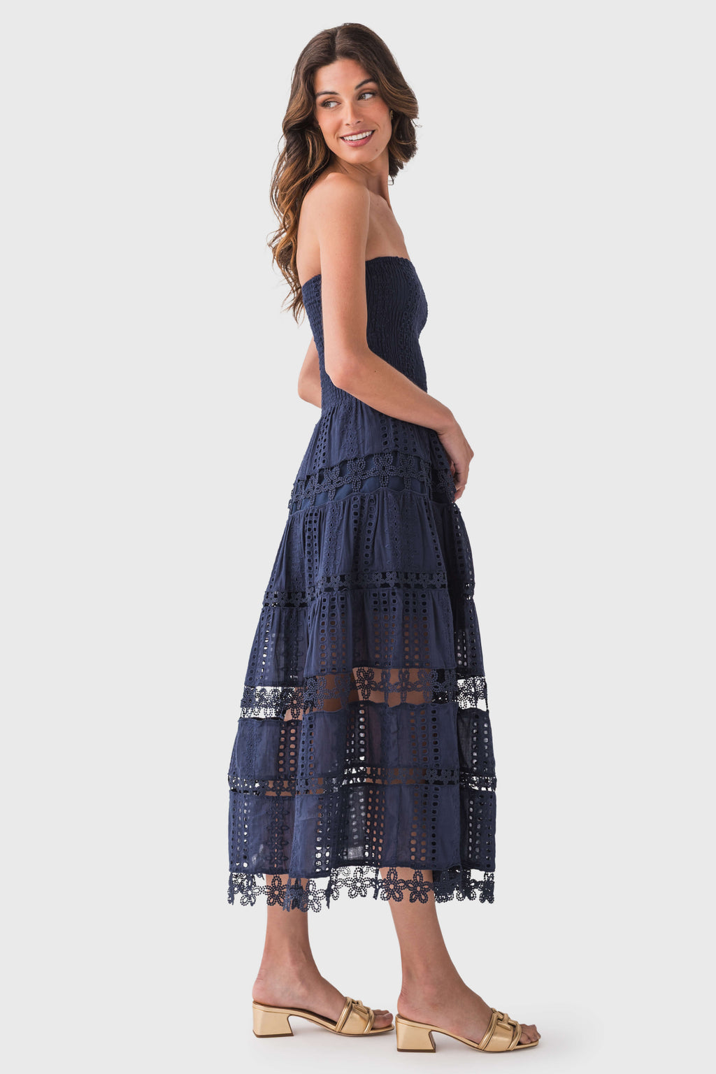 Navy strapless tube dress with tiered eyelet lace and scalloped hem