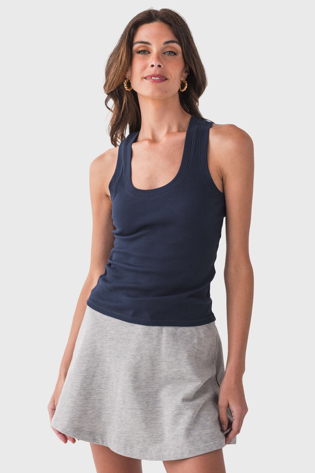 Navy ribbed sleeveless tank top with scoop neck and smooth fitted shape