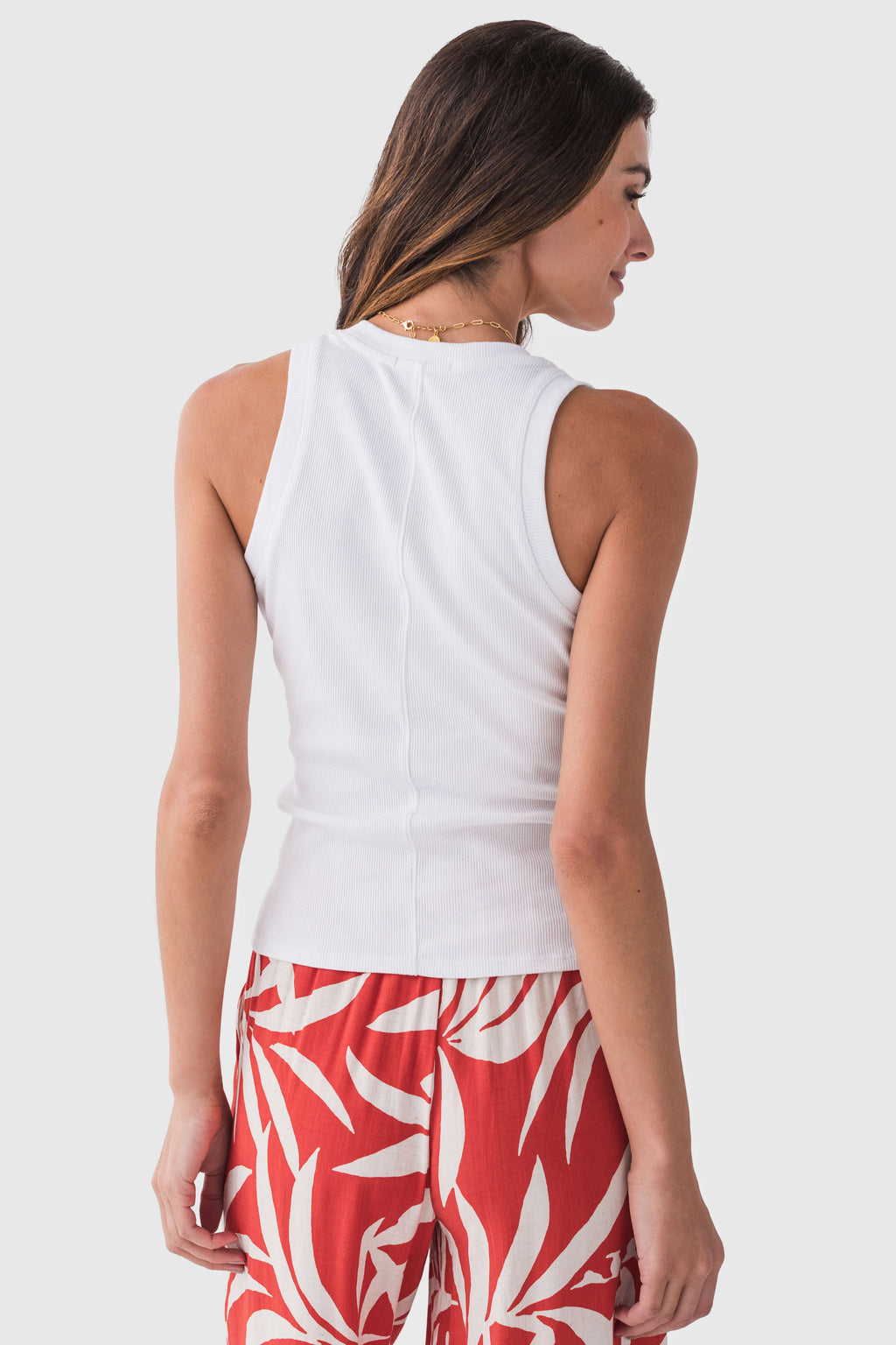 White ribbed tank top with scoop back and sleeveless cut