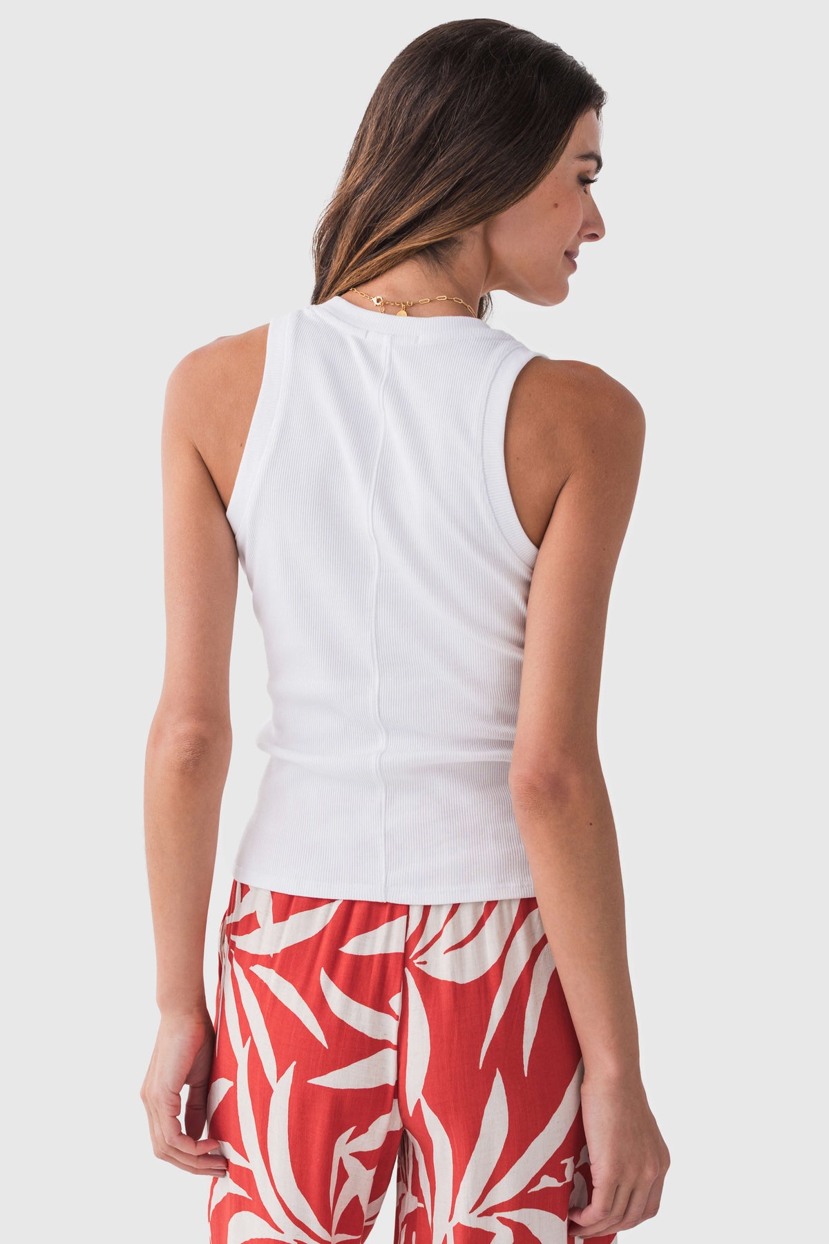 White ribbed tank top with scoop back and sleeveless cut