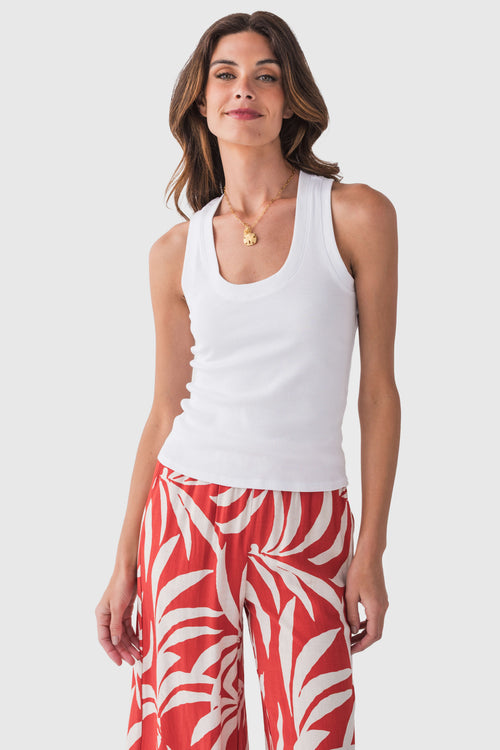 White ribbed tank top with scoop neckline and sleeveless cut