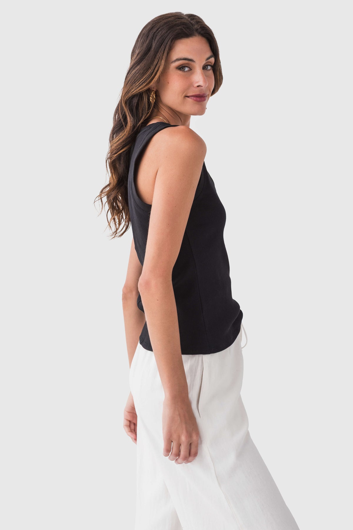 Black ribbed sleeveless tank top with scoop neck, fitted bodice