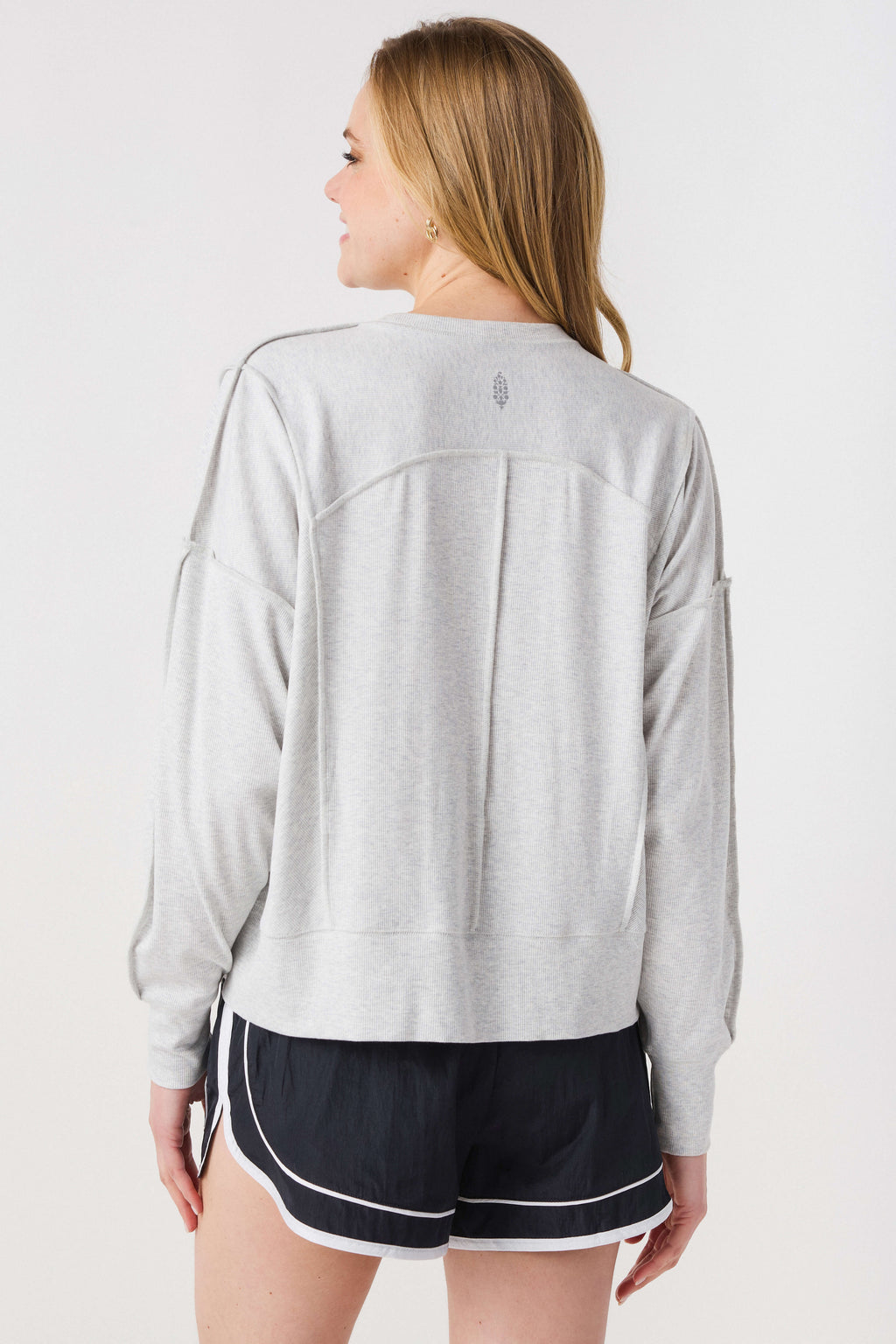 Heather grey long-sleeve tee, back view with relaxed crew-neck fit