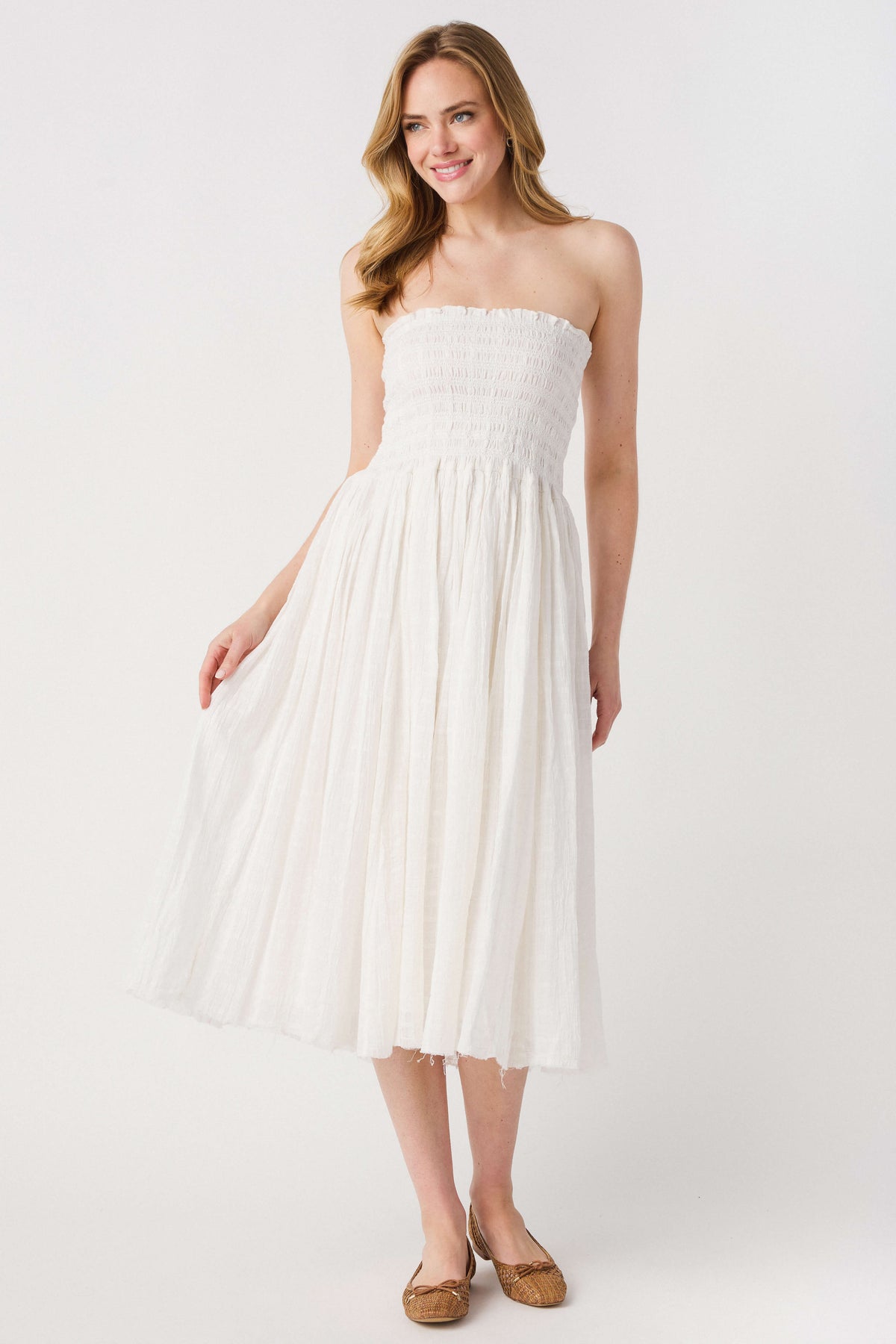 Ivory strapless maxi skirt with smocked bodice and flowy gathered skirt