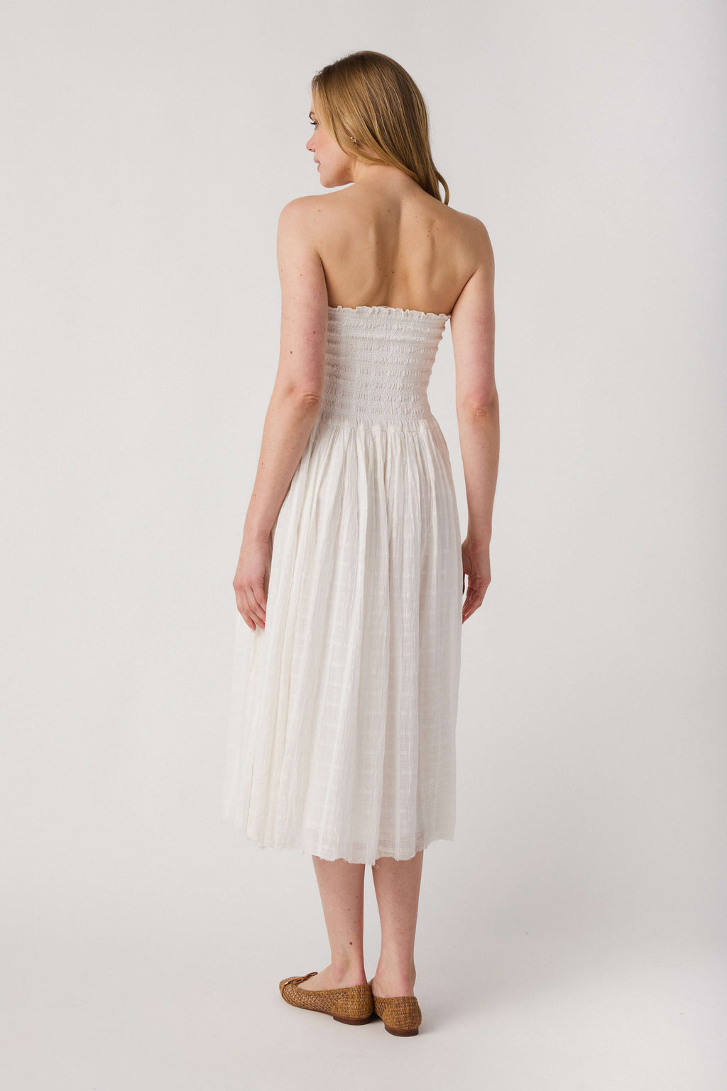 Ivory convertible maxi skirt with smocked bodice and gathered A-line midi length