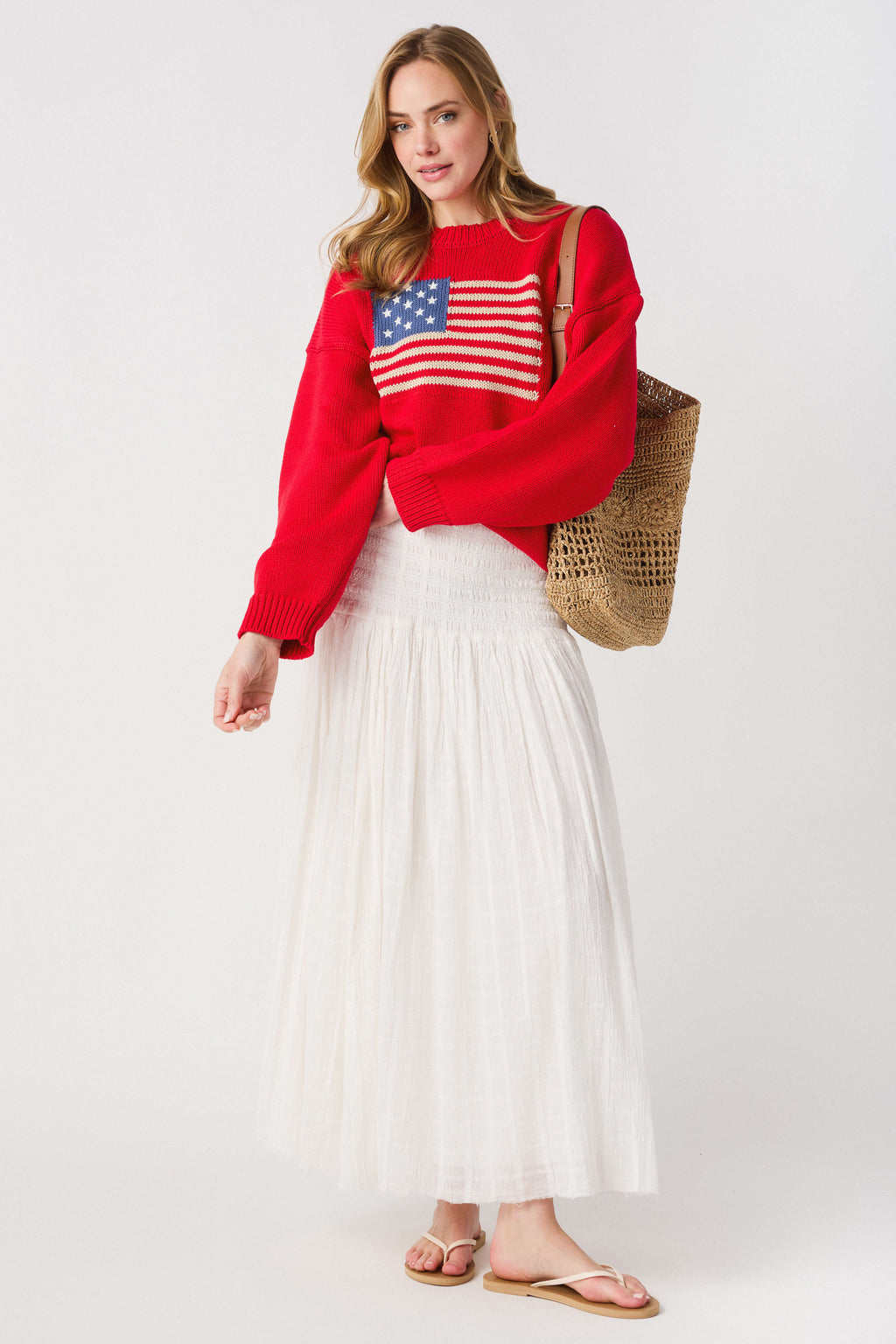 Ivory tiered maxi skirt with smocked waist and gathered pleats
