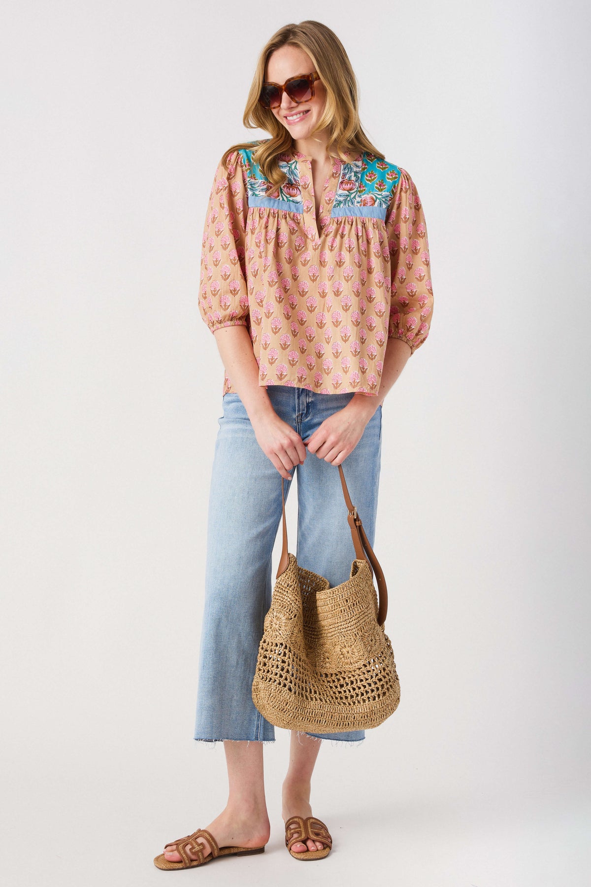 Women’s block print top in pink with teal yoke and floral pattern