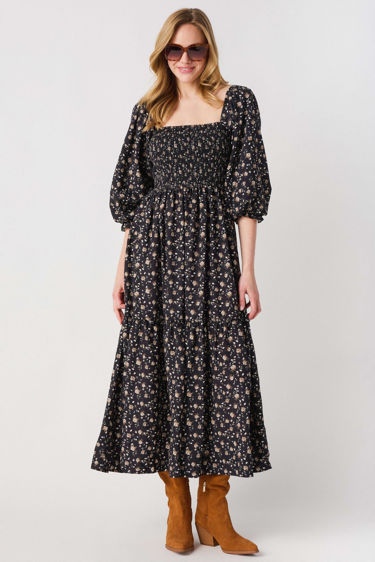 Black floral midi dress with square neckline, 3/4 puff sleeves and full skirt