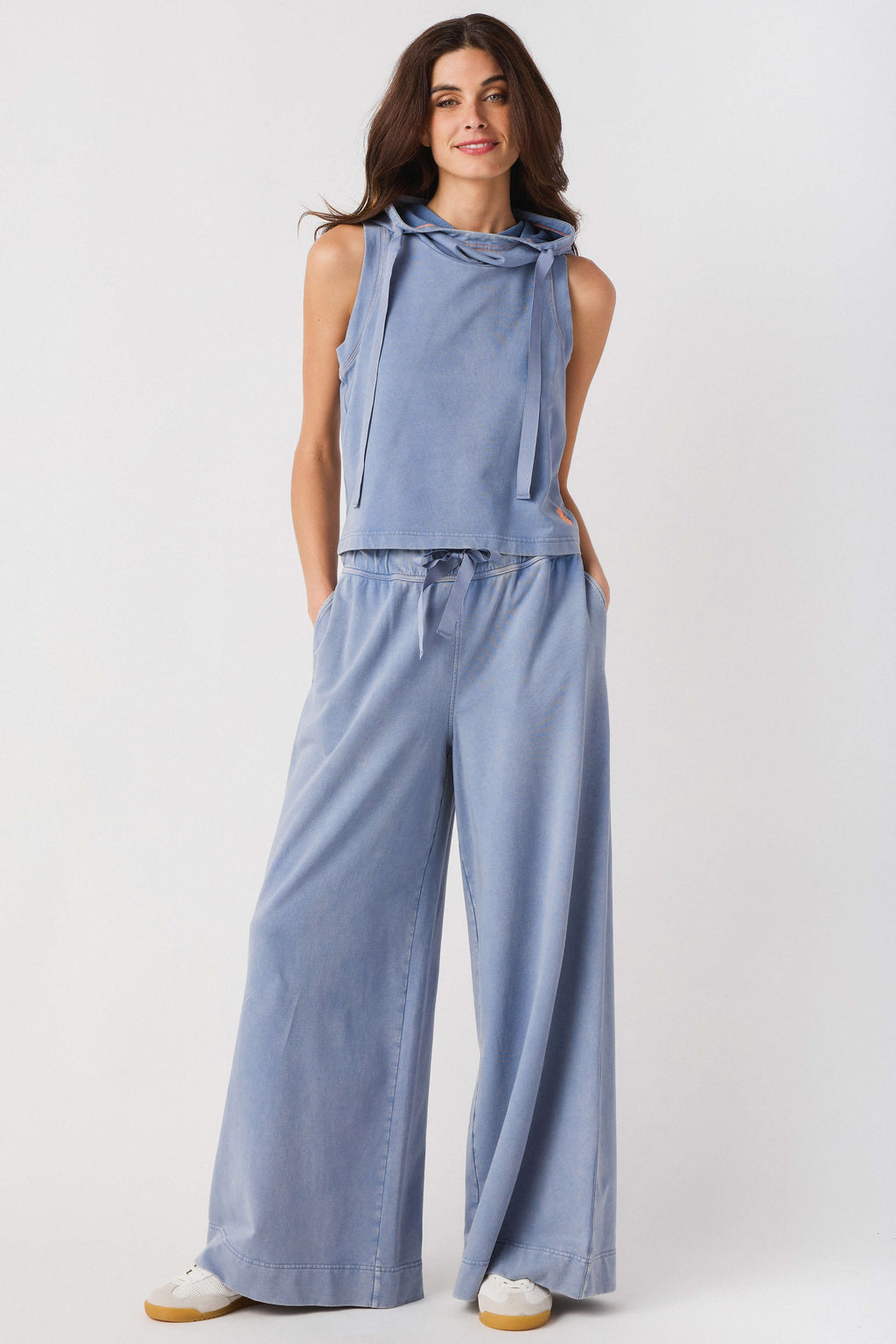 Light blue sleeveless hoodie top and wide-leg pants set, full-length front view