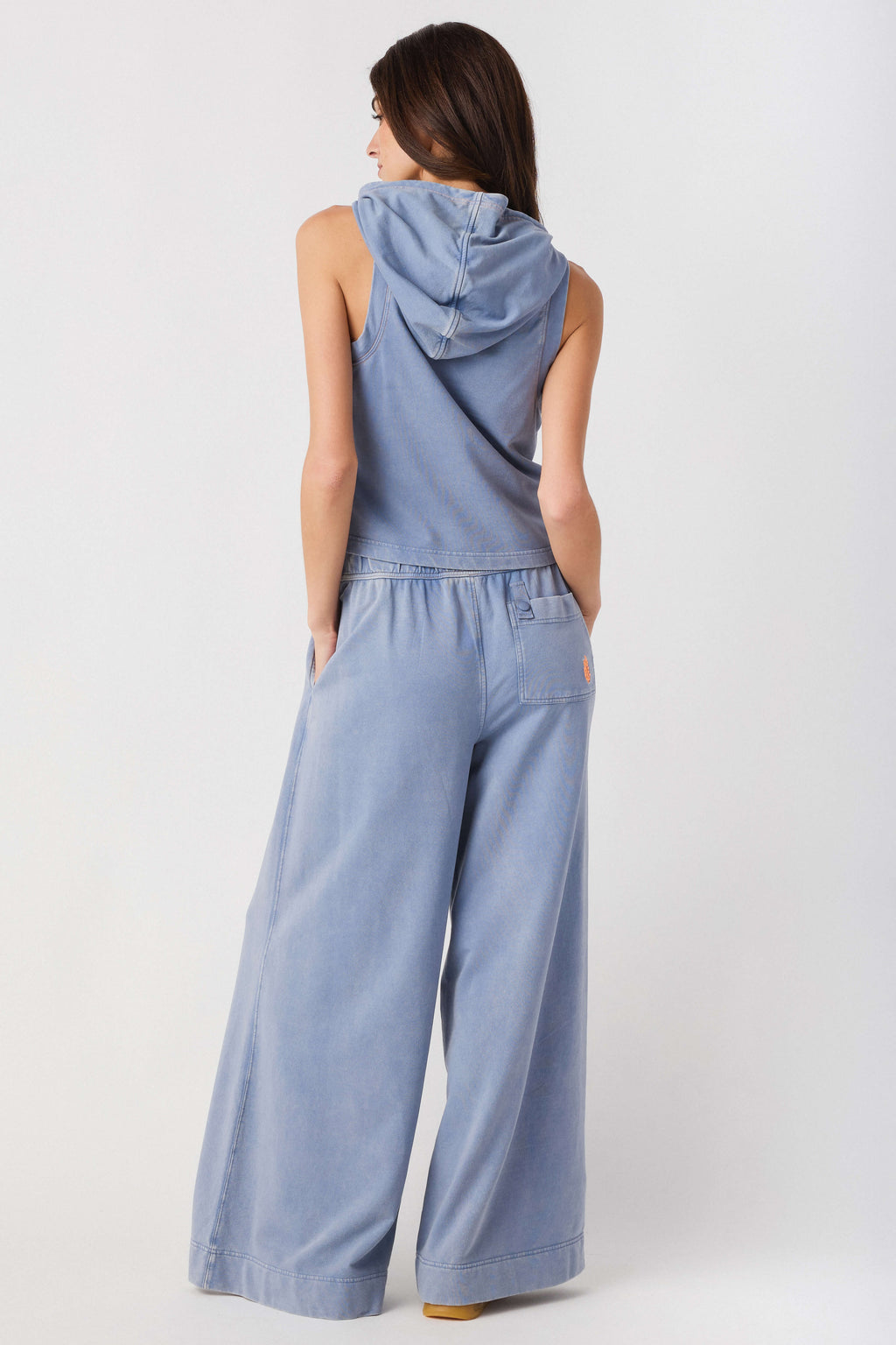 Light blue sleeveless hoodie top and wide-leg pants set, back view with hood