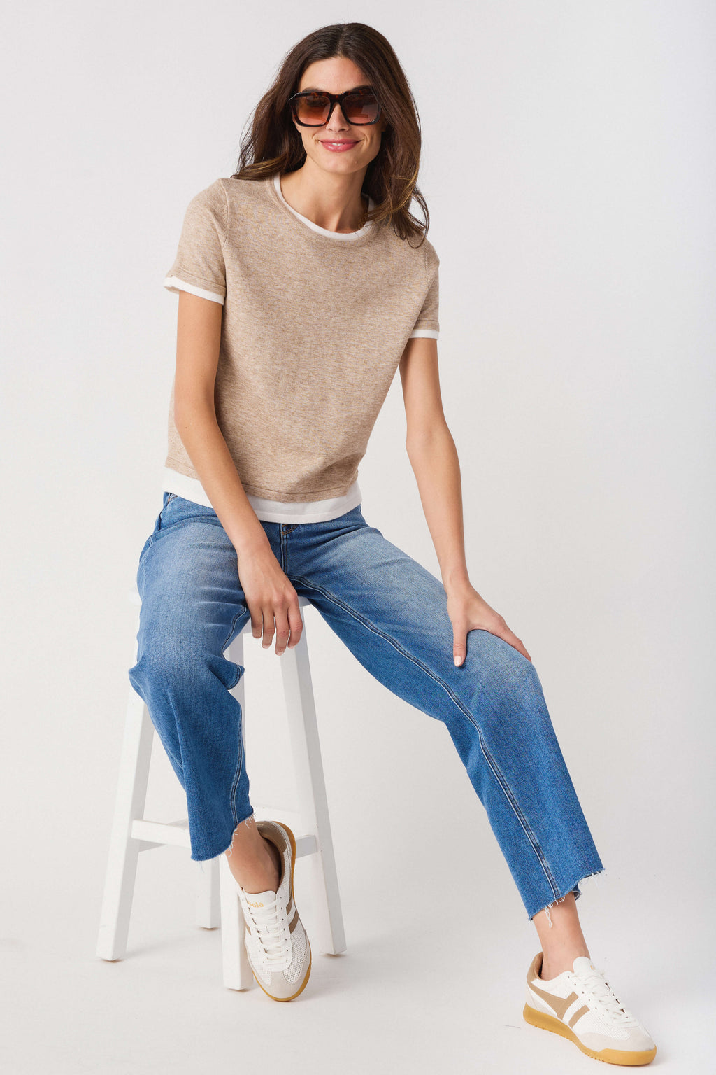 Taupe double-layer knit top with white trim, crew neck and short sleeves.
