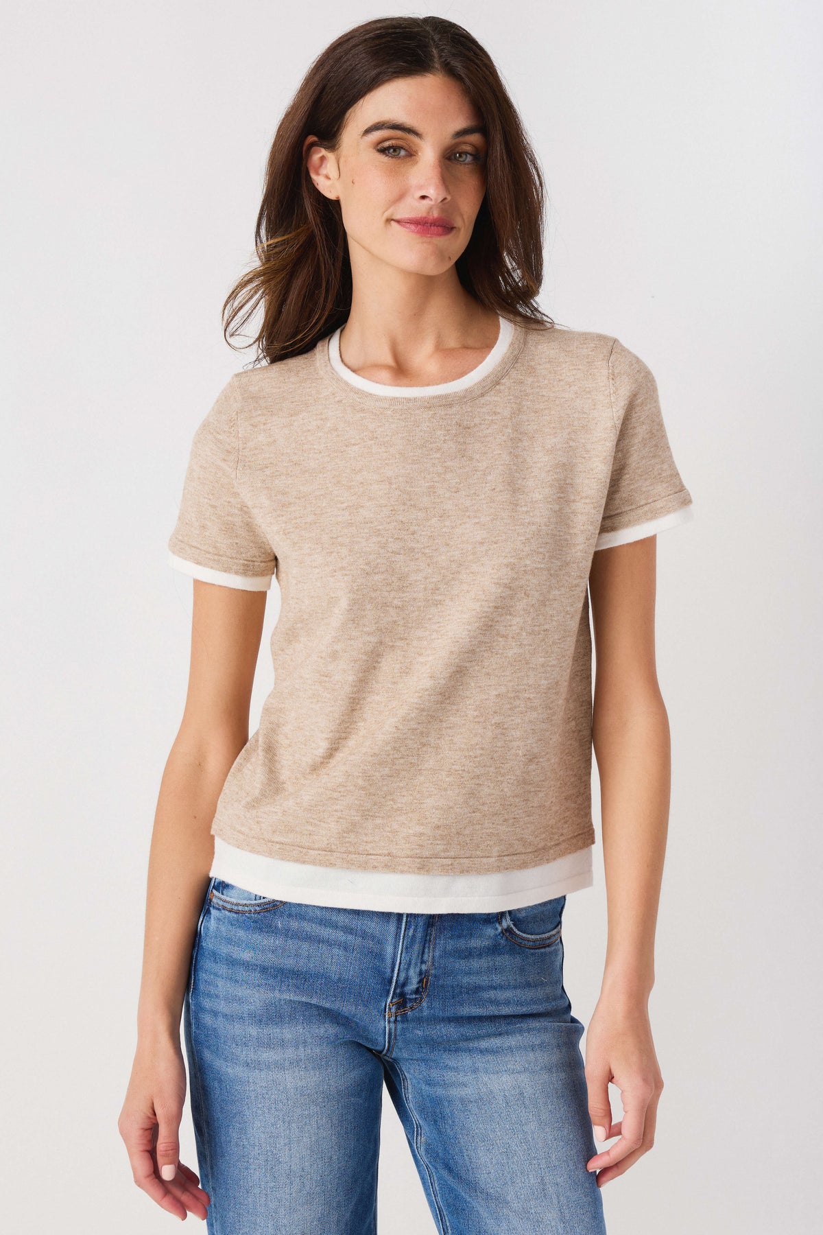 Taupe double-layer knit top with white crew neck and sleeve trim, straight hem.