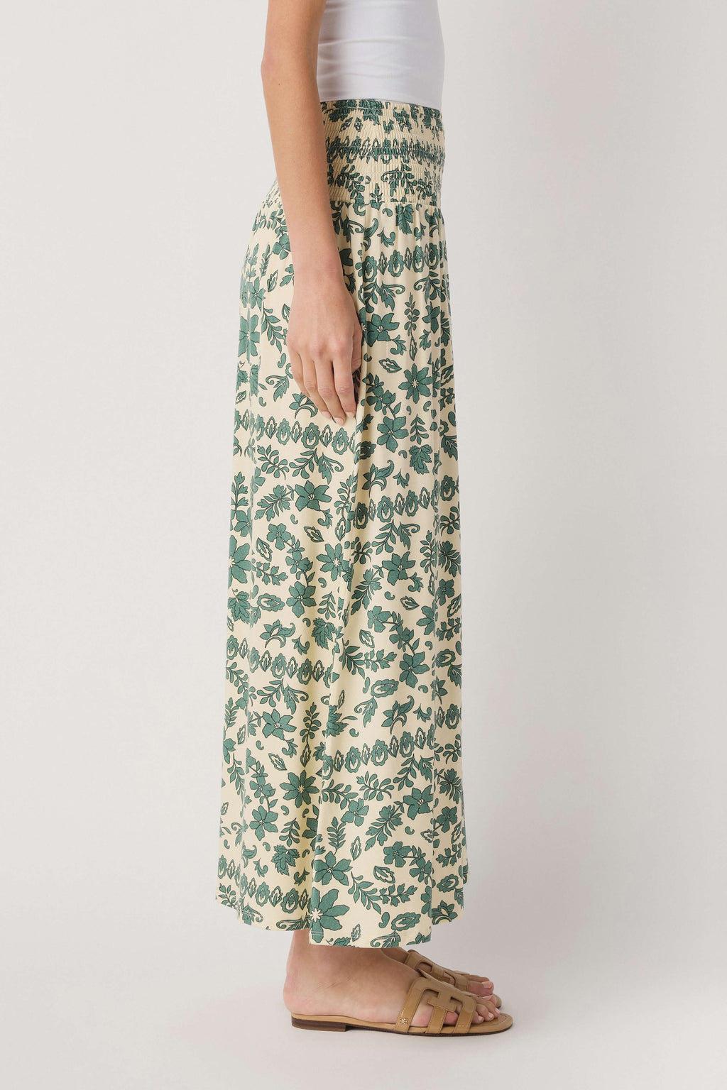 Green and cream paisley print maxi skirt in a flowing side view