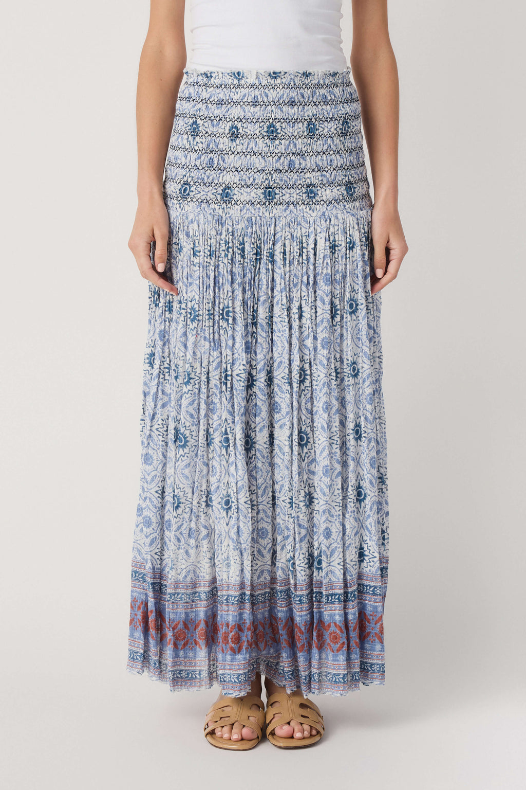 Blue printed tiered maxi skirt with smocked waistband and banded hem details