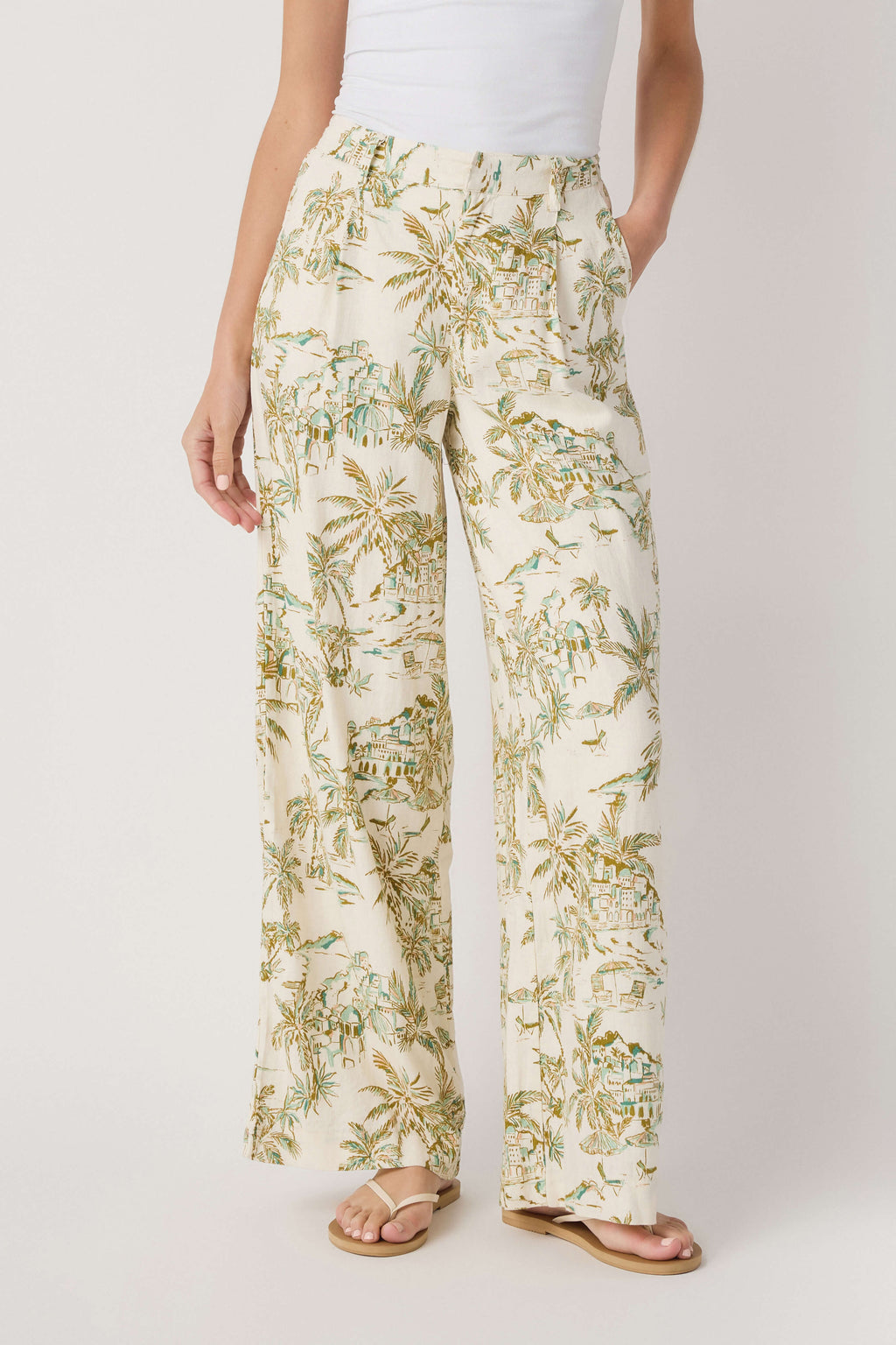Wide-leg linen pants with elastic waistband and tropical palm print, cream base