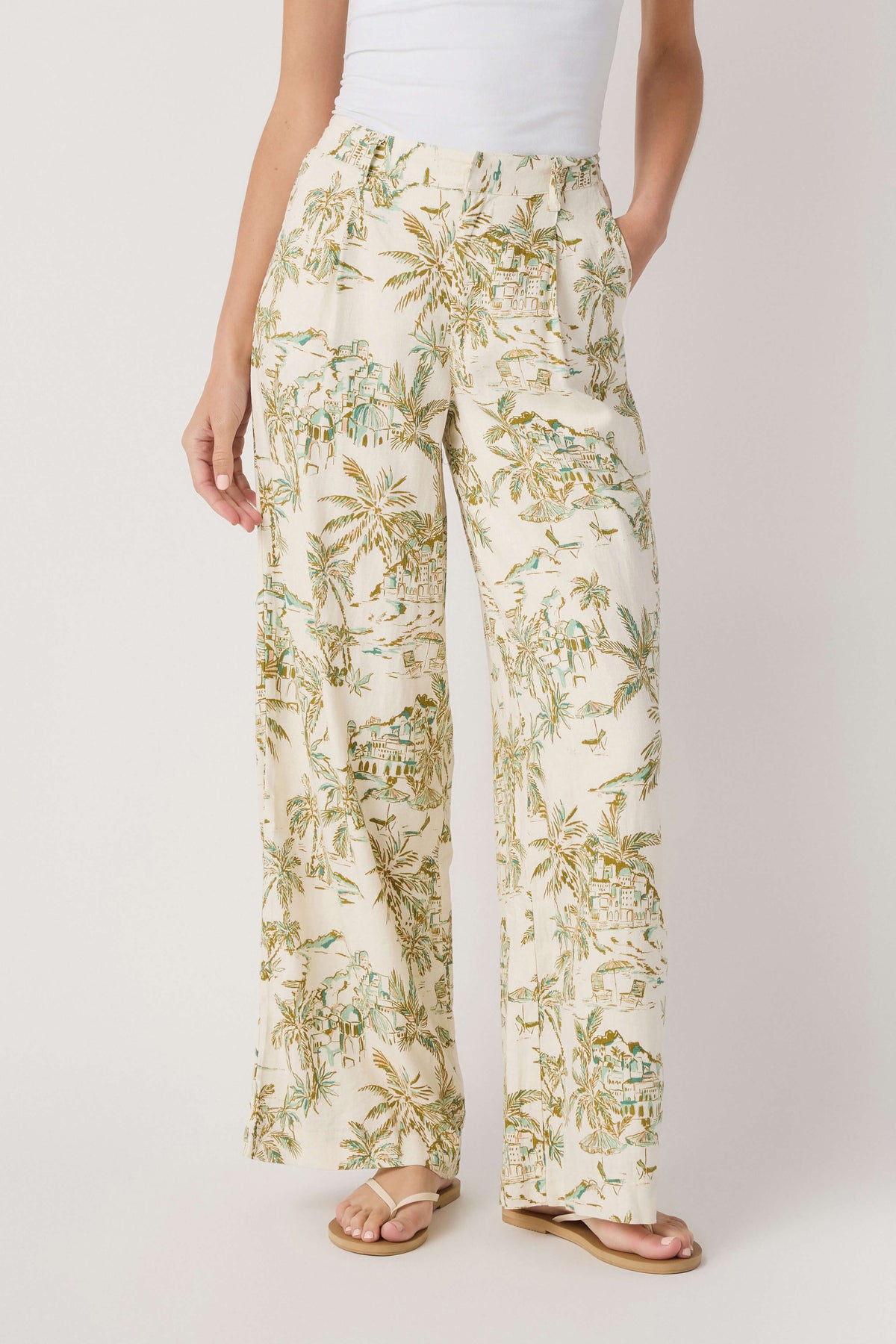 Wide-leg linen pants with elastic waistband and tropical palm print, cream base