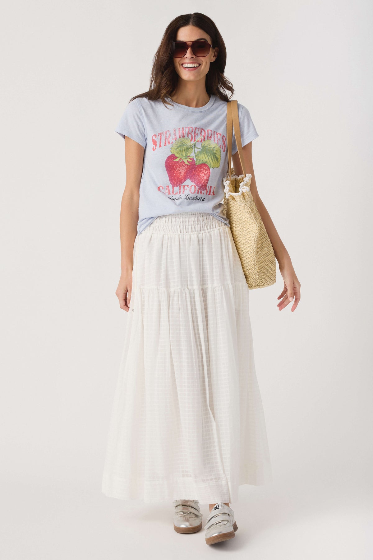 Off-white tiered maxi skirt with smocked elastic waist and flowing tiers