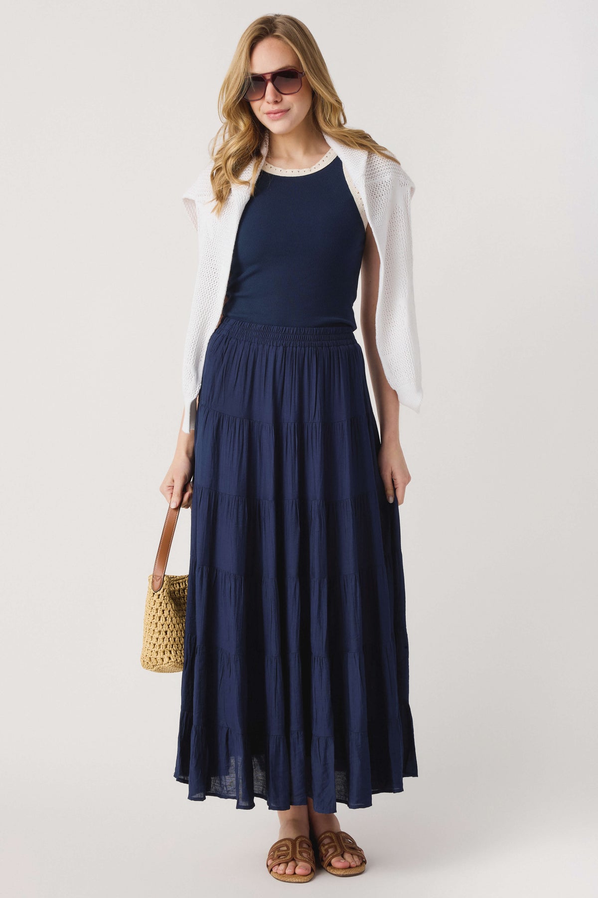 Navy ribbed tank top with contrast lace-trim neckline and sleeveless cut