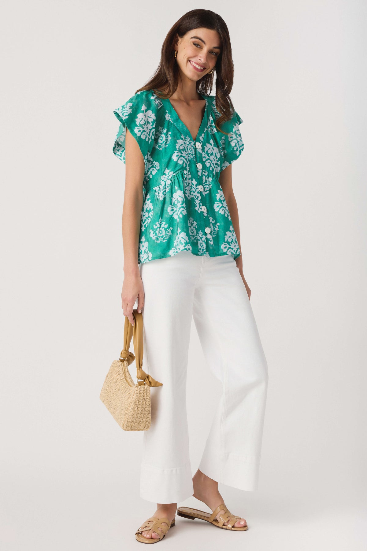 Tan woven top-handle mini bag with braided handles
