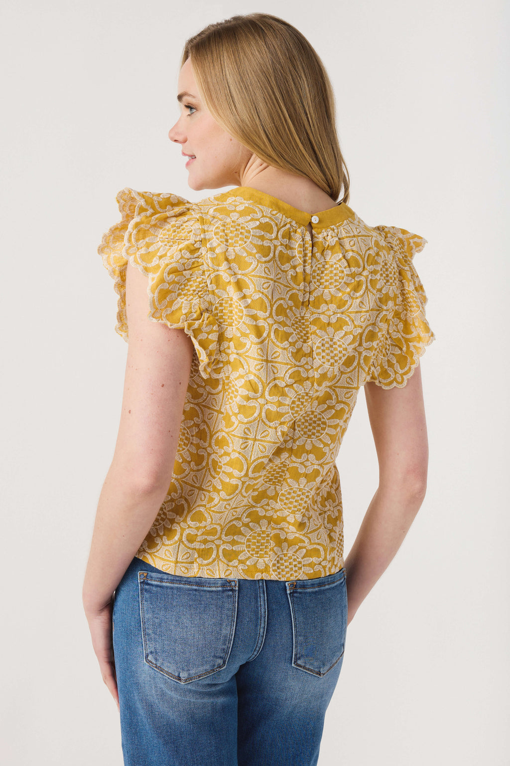 Mustard printed ruffle-sleeve top, back view with yoke detail