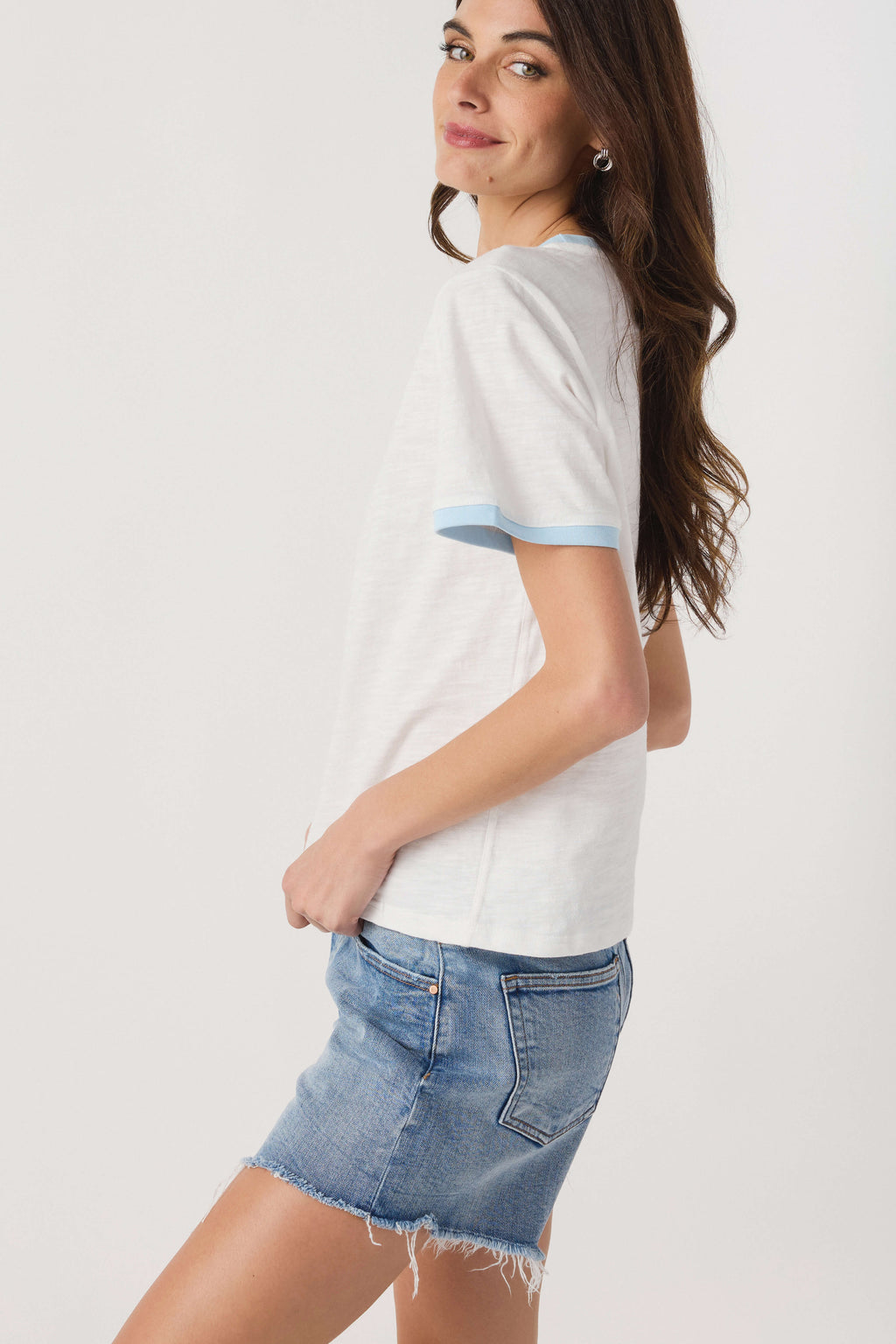 White slub ringer tee with light blue trim, side view short sleeves and hem
