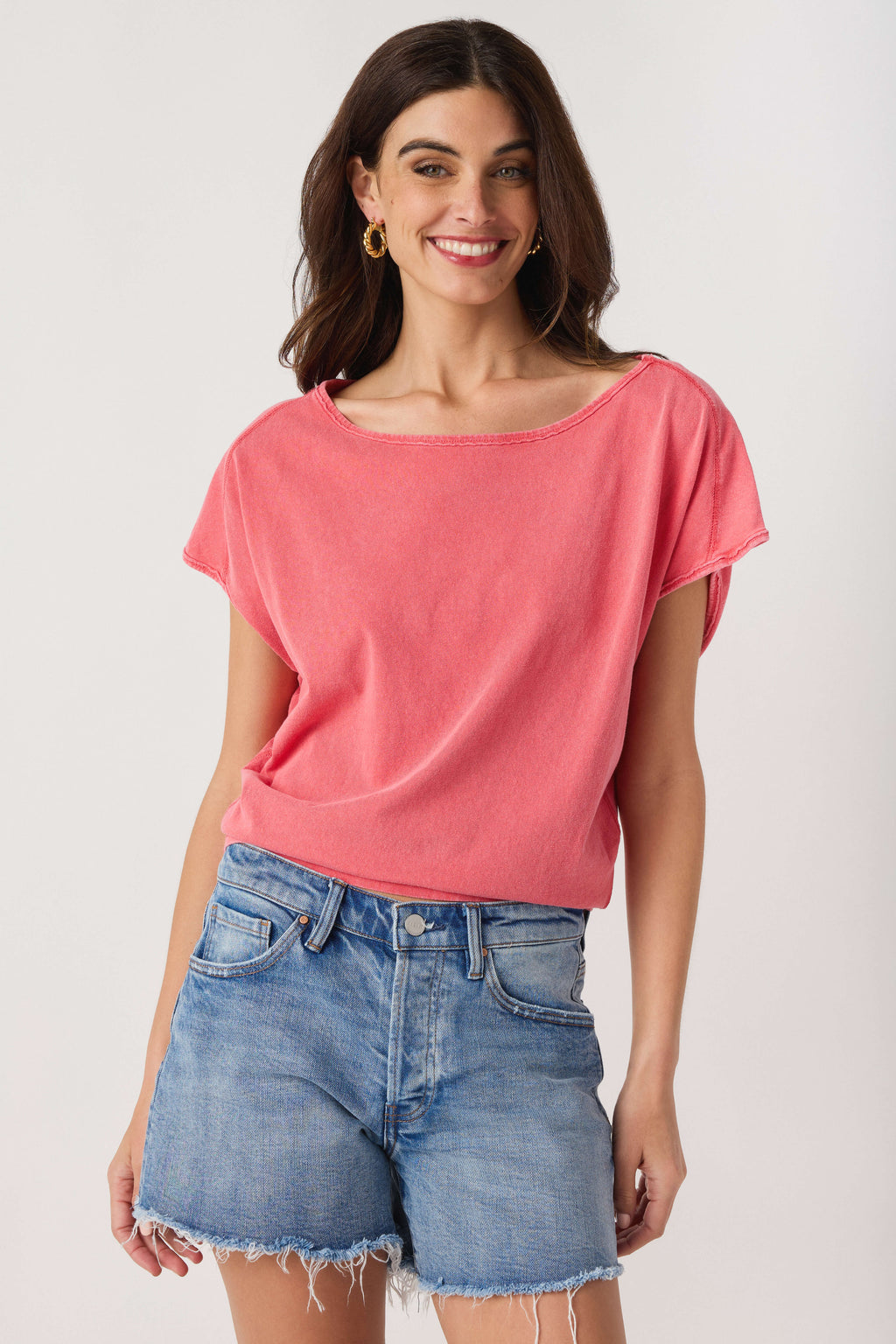 Pink crew-neck short-sleeve tee with relaxed fit and smooth drape