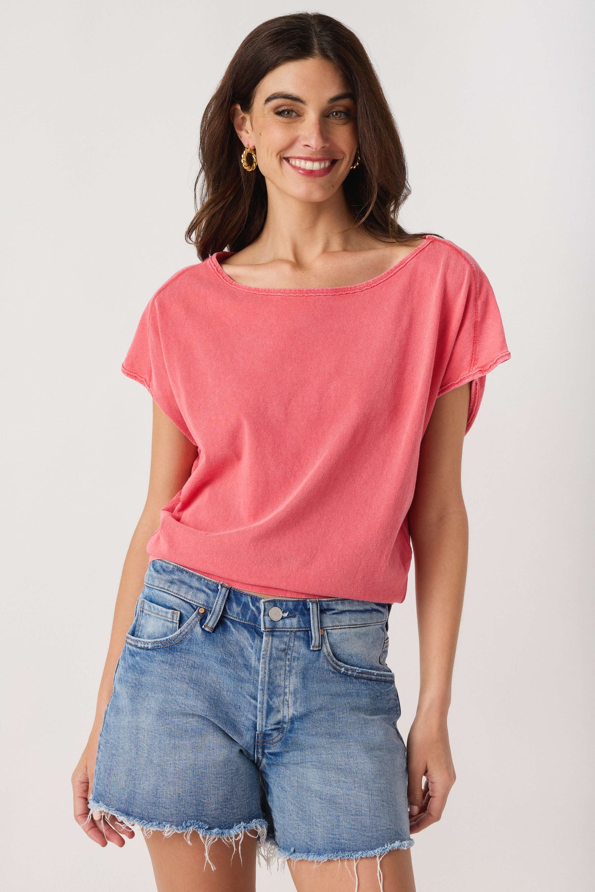 Pink crew-neck short-sleeve tee with relaxed fit and smooth drape