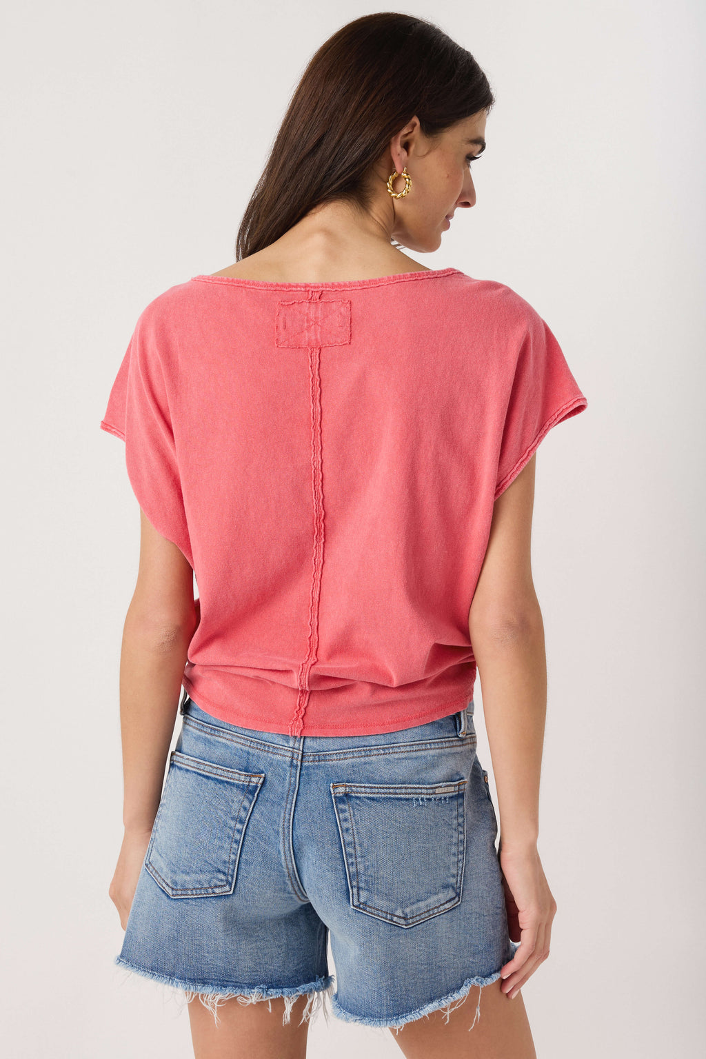 Pink back of short-sleeve crew-neck tee with center seam and yoke detail