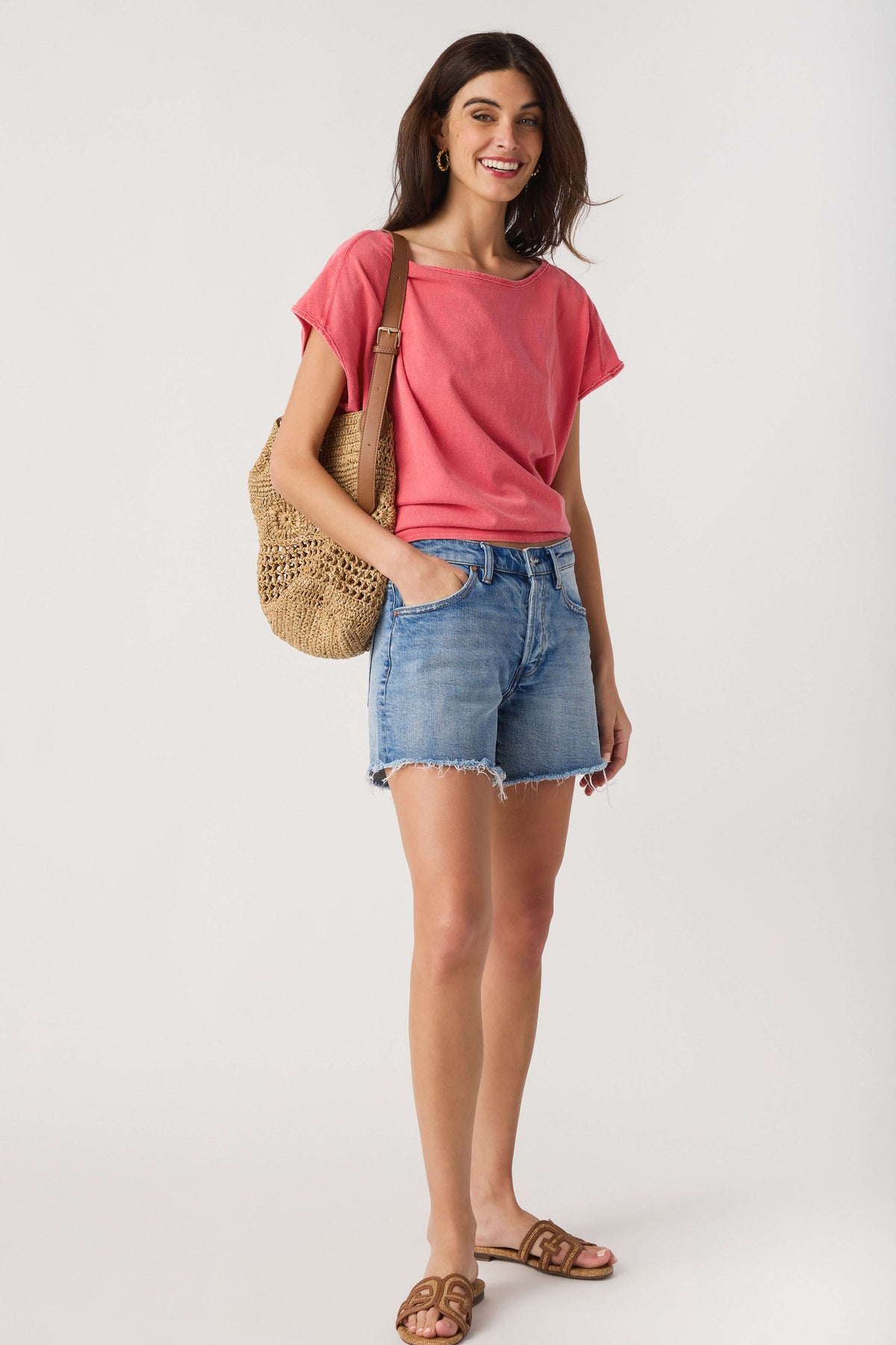 Pink crew-neck short-sleeve tee with relaxed fit, full-body view