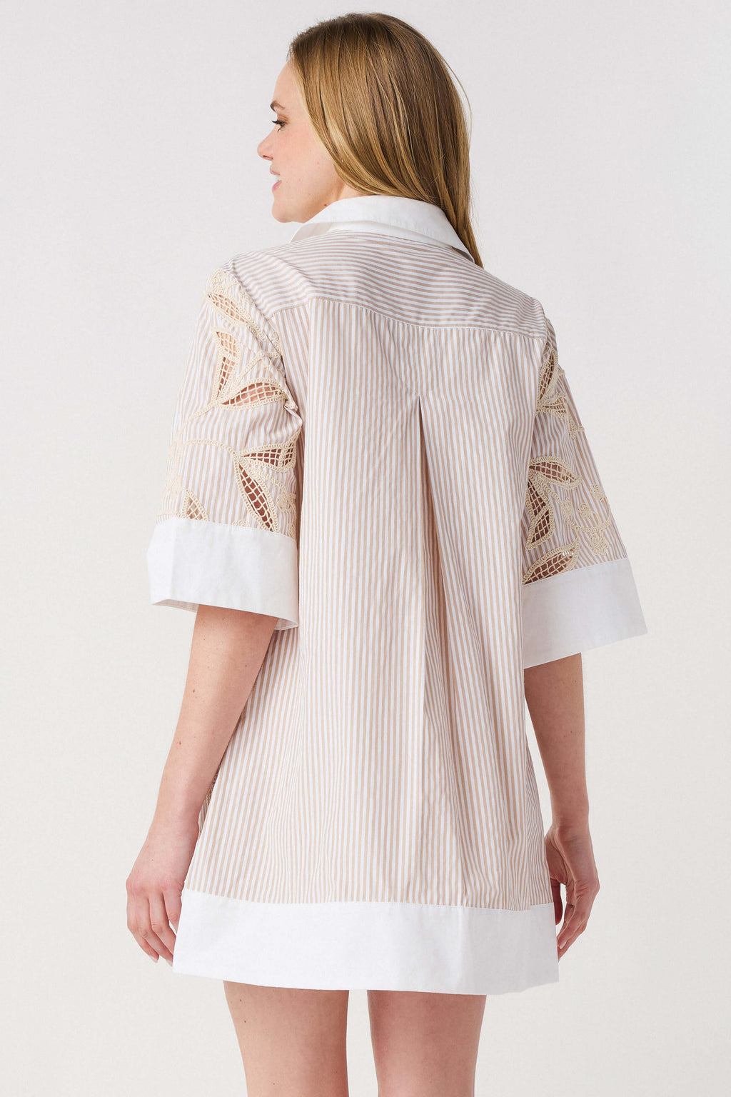Floral embroidered shirt dress back with white hem and cuff details; light taupe stripes.