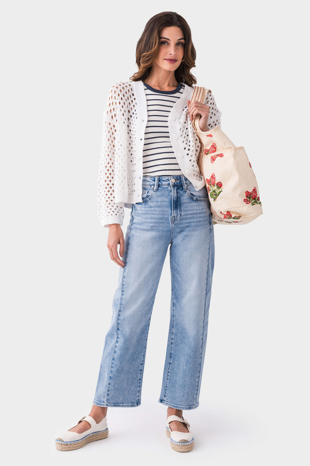 High-rise barrel jeans in light blue wash with front seam and relaxed barrel fit