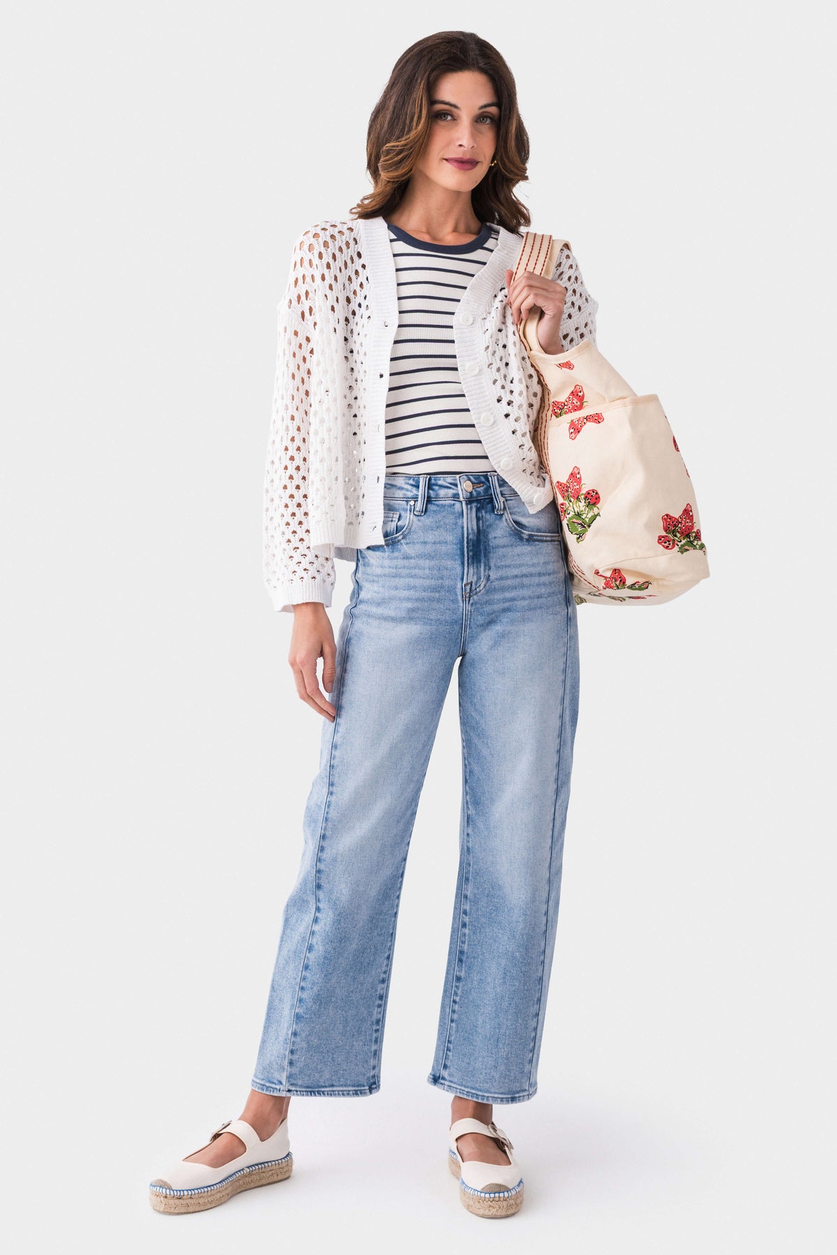 High-rise barrel jeans in light blue wash with front seam and relaxed barrel fit