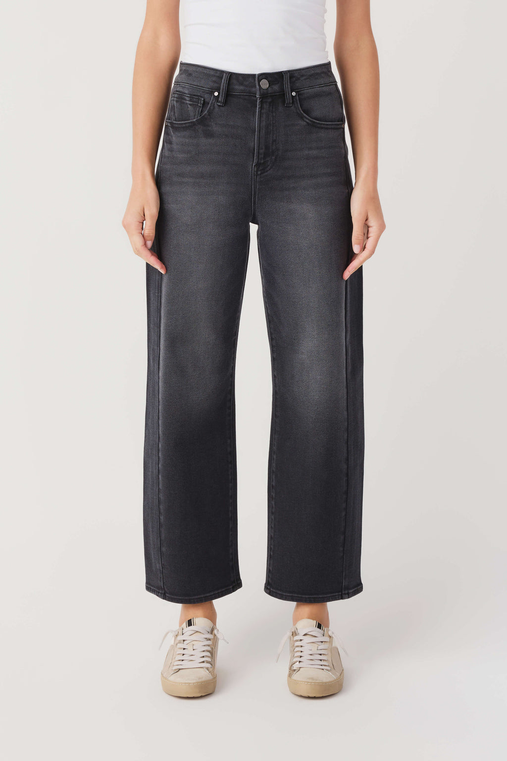 High-rise barrel jeans in dark denim wash, relaxed straight-leg fit with button waistband