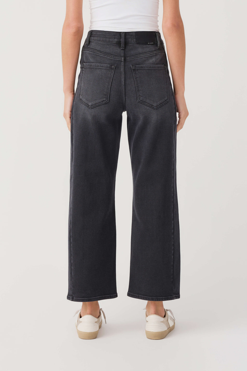 High-rise barrel jeans in dark wash denim, straight wide legs with front slash pockets