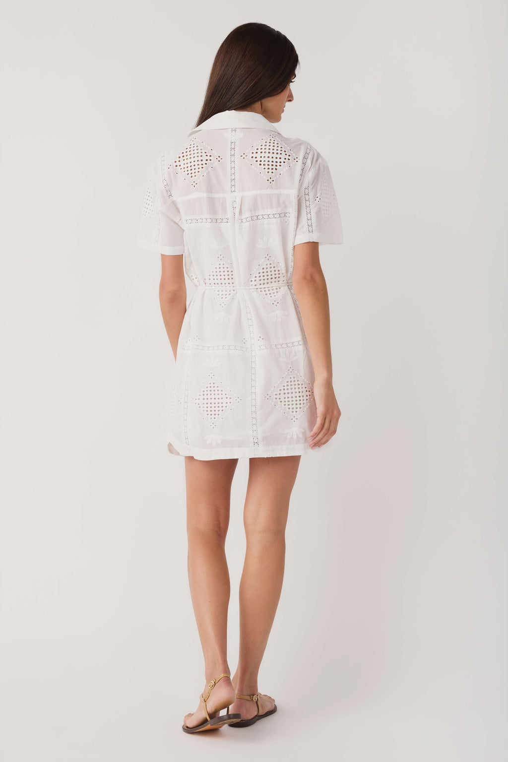 White eyelet mini dress with short sleeves and eyelet back yoke, rear view