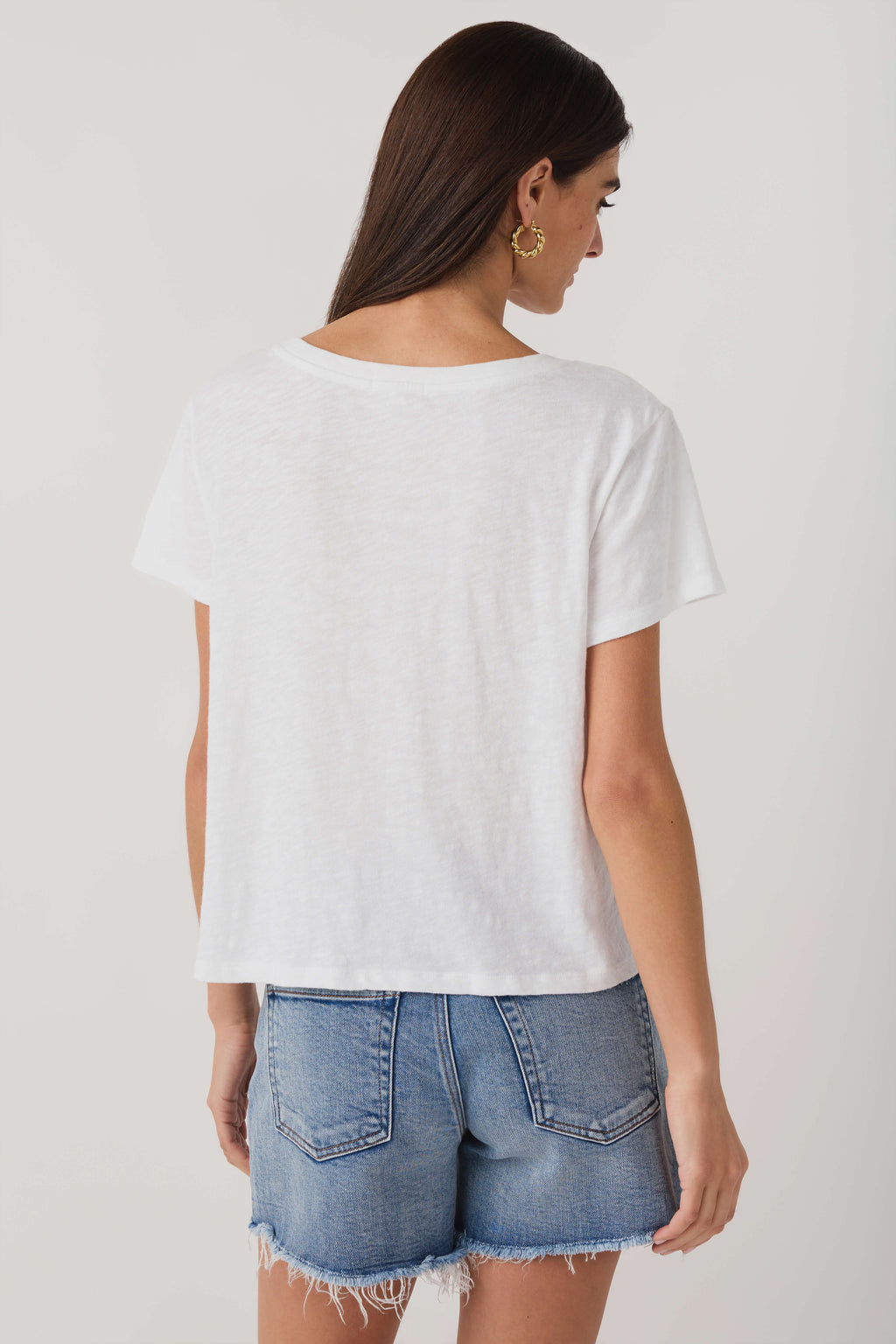 White V-neck short-sleeve tee from back view, plain jersey knit