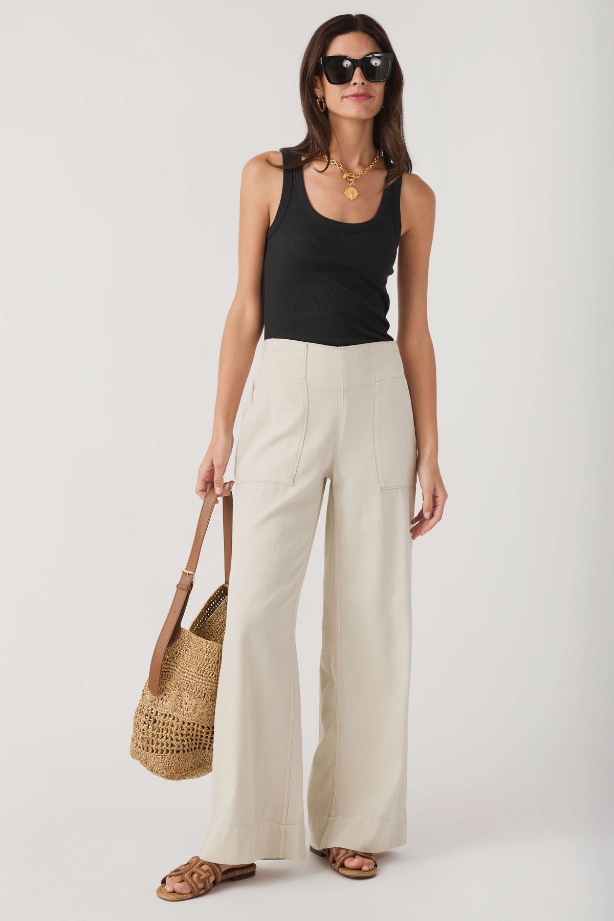 Black scoop neck tank top with wide shoulder straps
