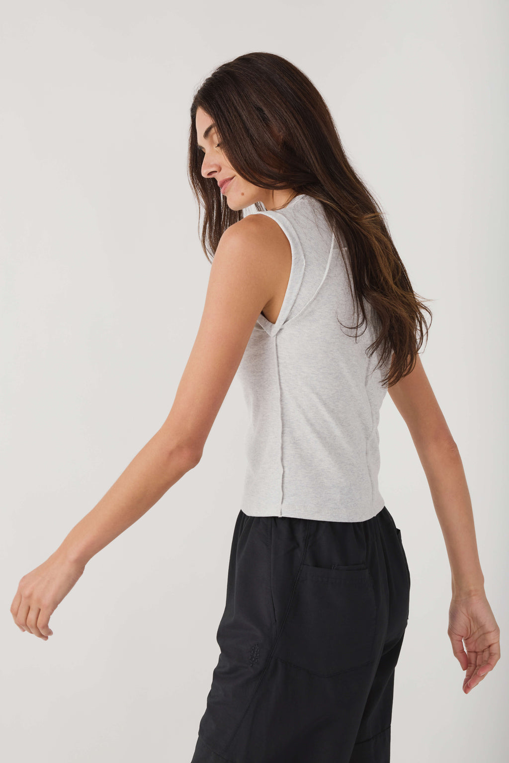 Light gray heather muscle tank from side view with sleeveless cut