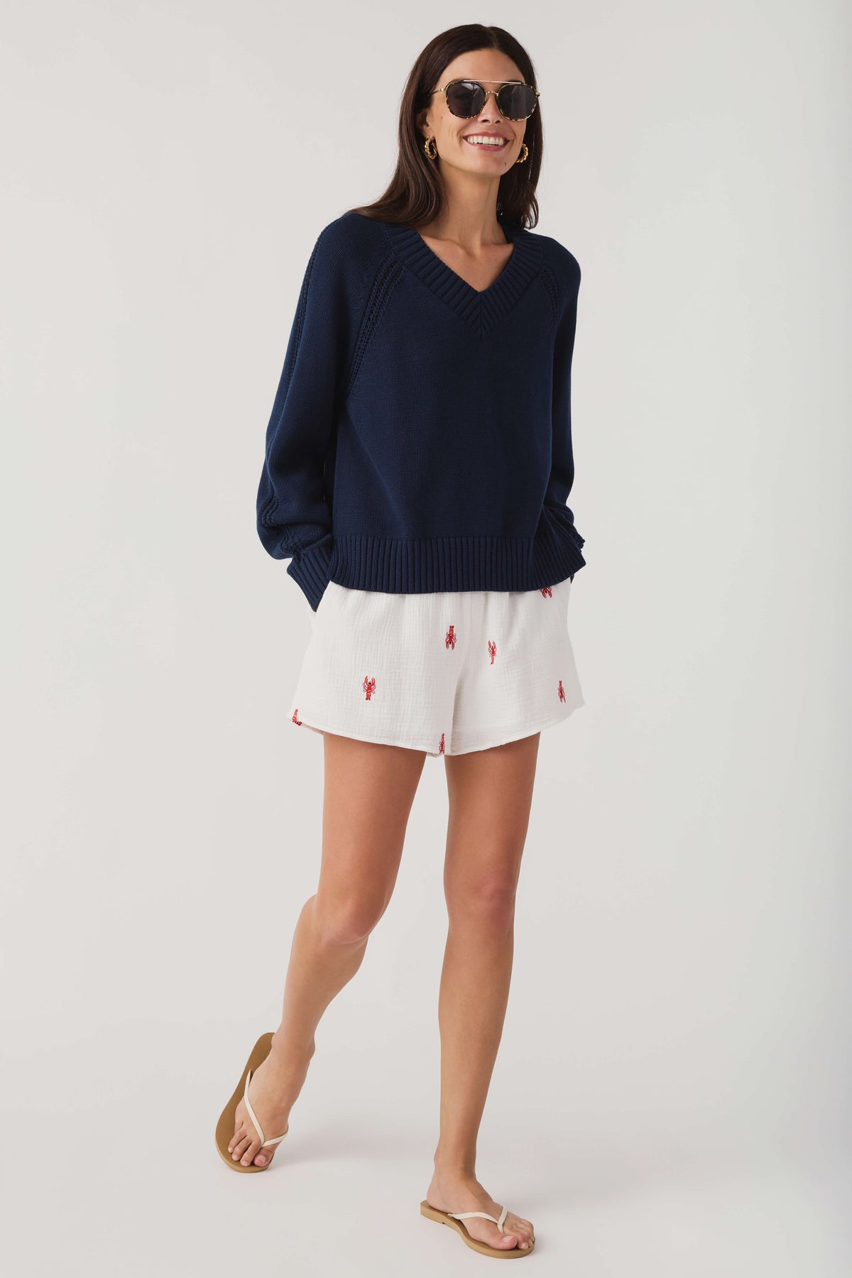 Women's Eclipse navy V-neck knit sweater with ribbed hem and long sleeves