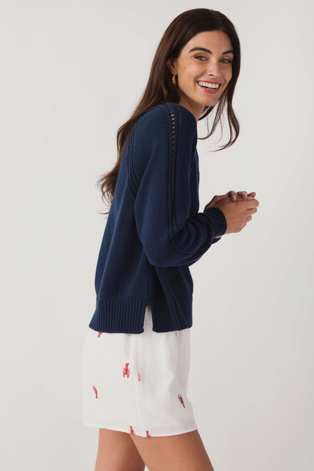 Women's Eclipse navy V-neck knit sweater with ribbed cuffs and decorative dotted shoulders