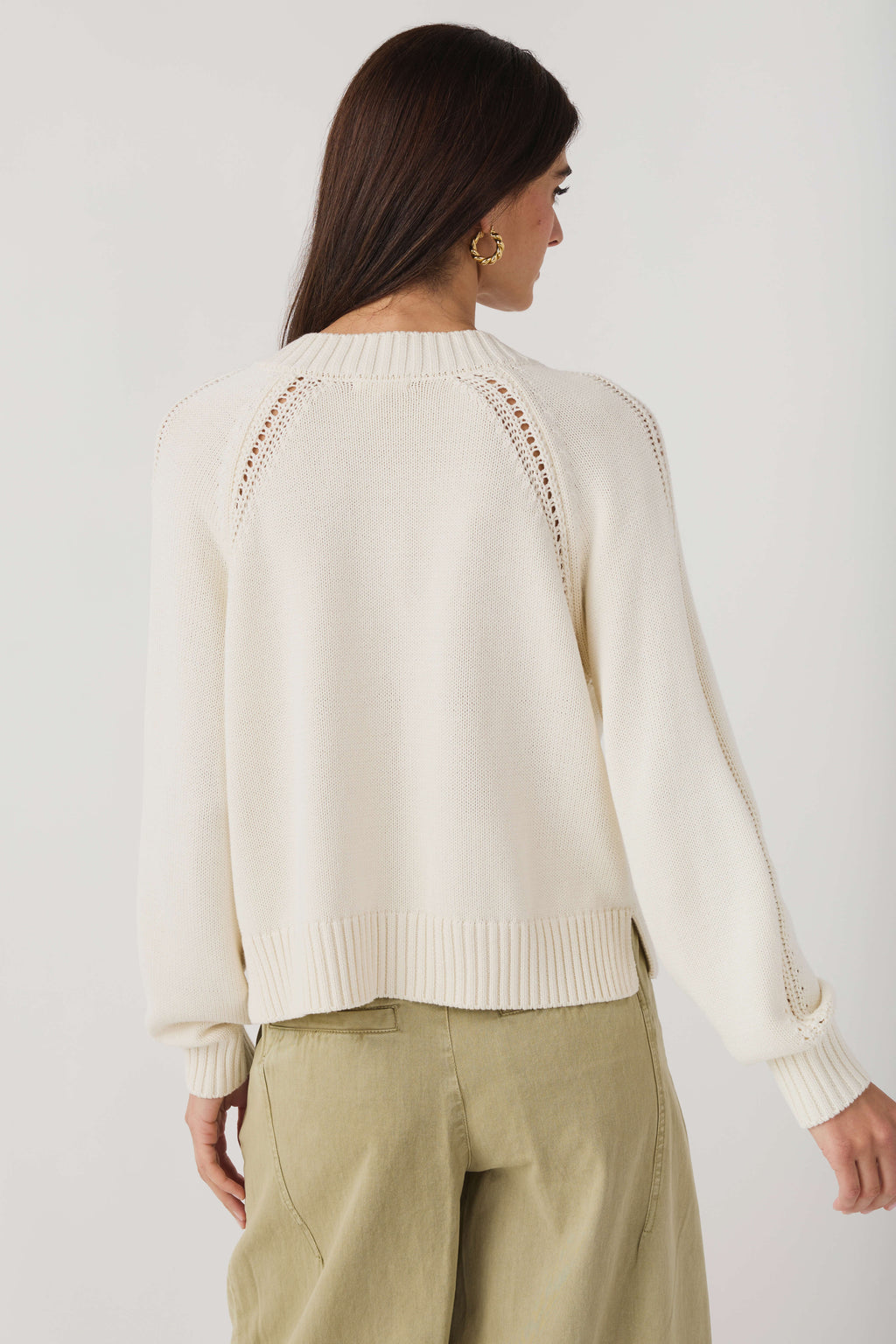 Women's light sand V-neck knit sweater, ribbed back hem and decorative dotted shoulders