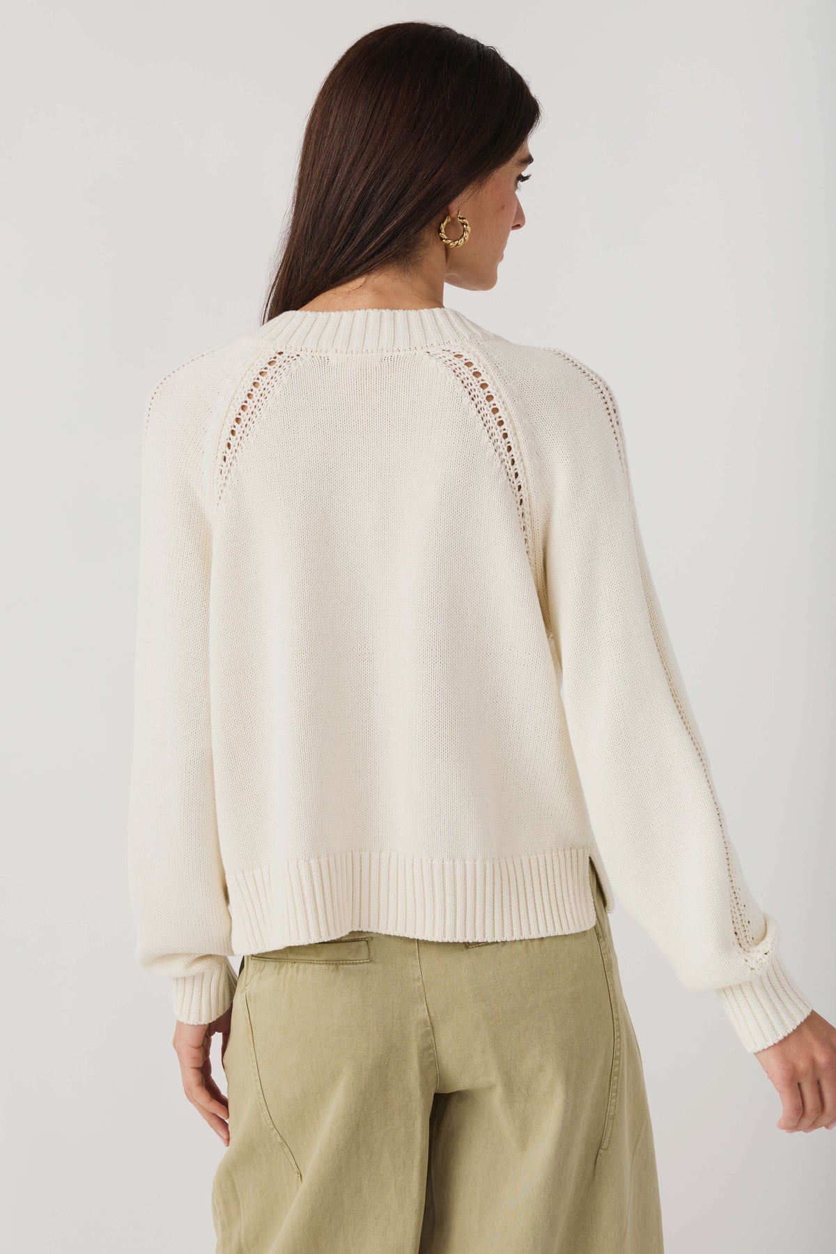 Women's light sand V-neck knit sweater, ribbed back hem and decorative dotted shoulders