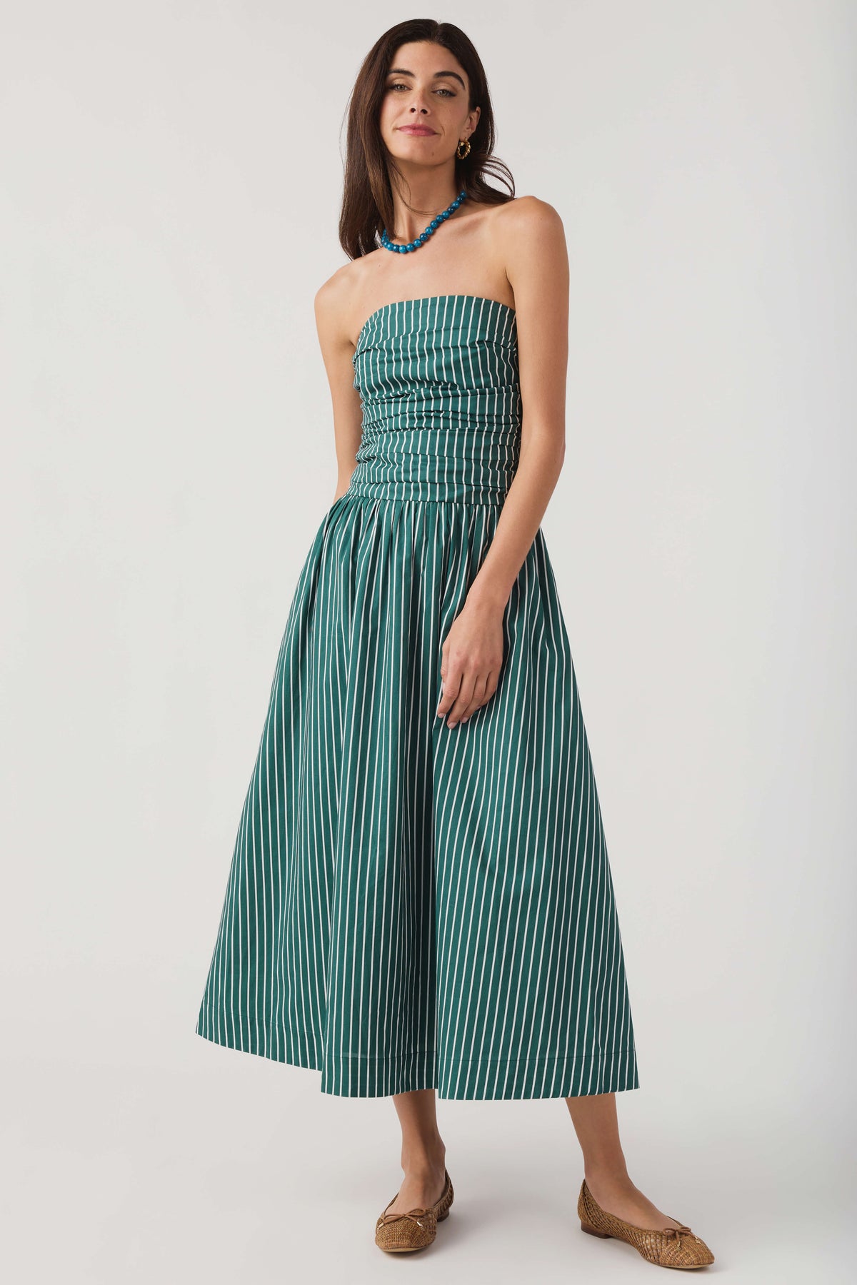 Hunter green striped strapless midi dress with sleeveless neckline and gathered waist